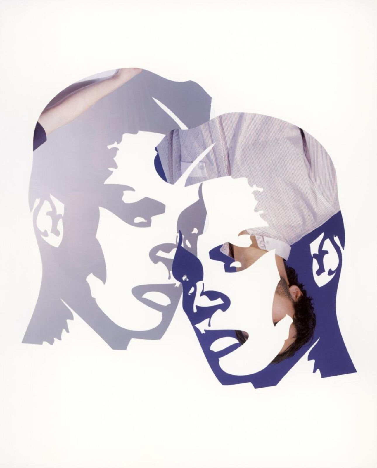 A couple of people that are cut out of paper.