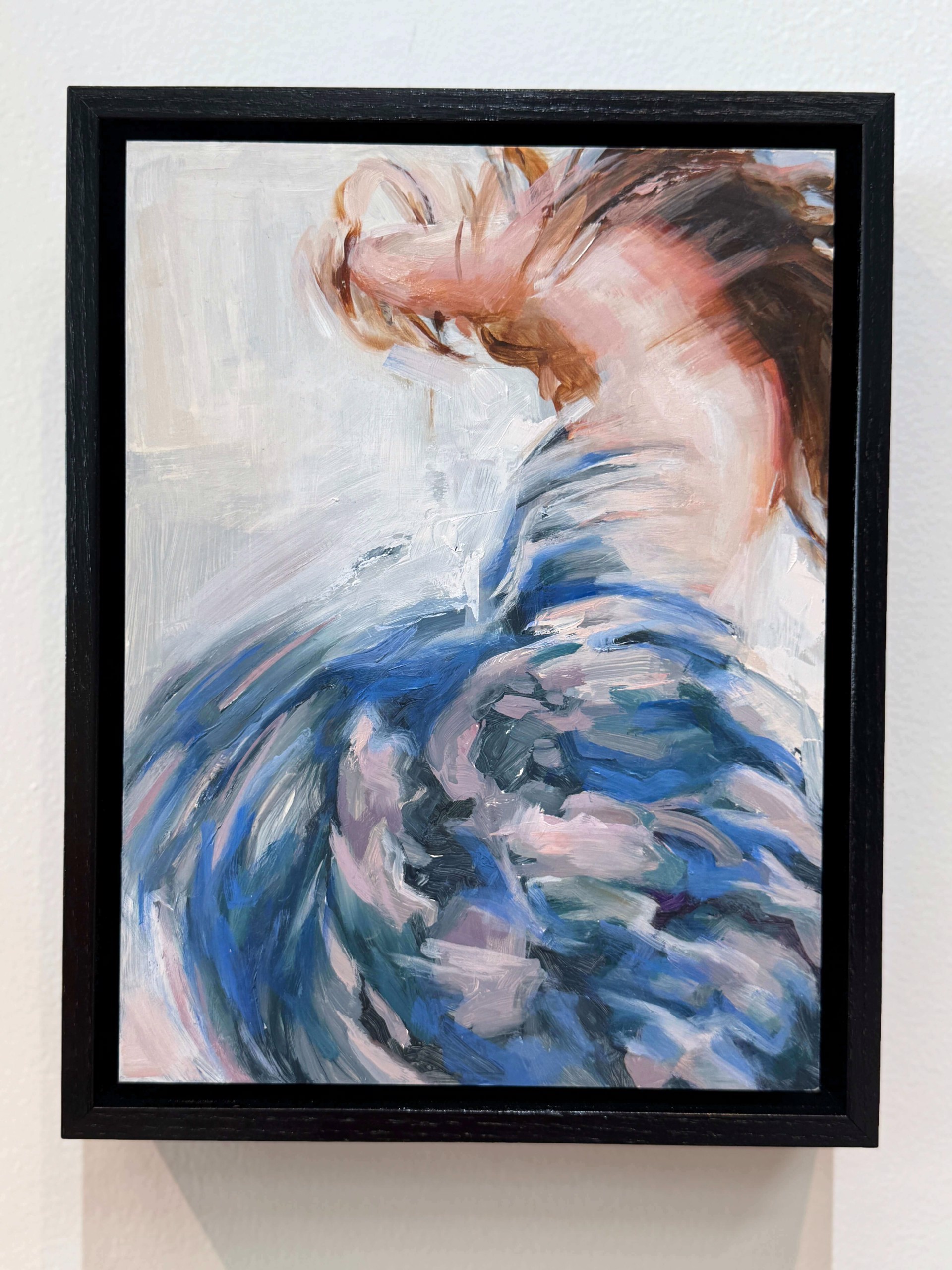 A painting of a woman in a blue dress.