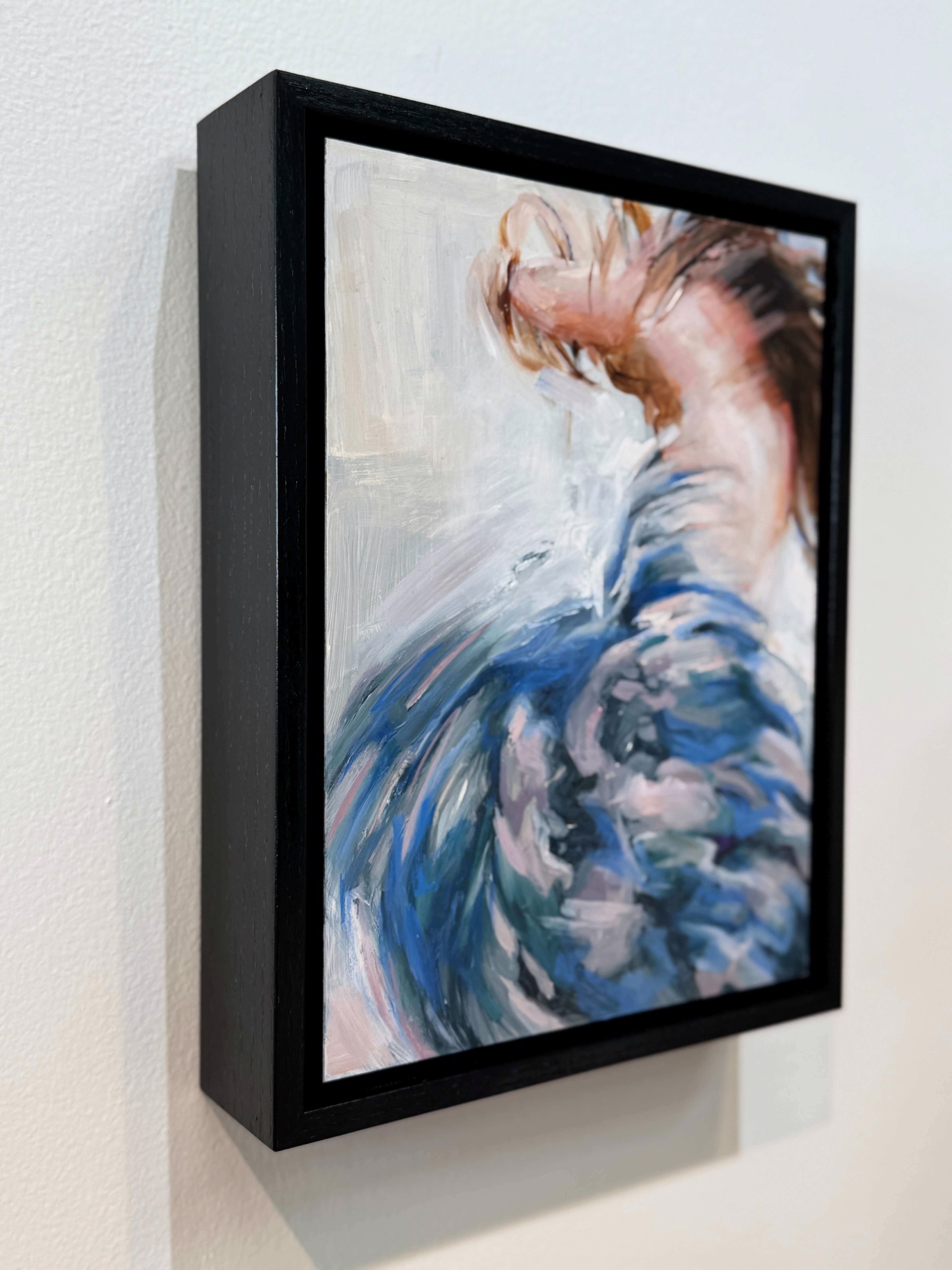 A painting of a woman in a blue dress.