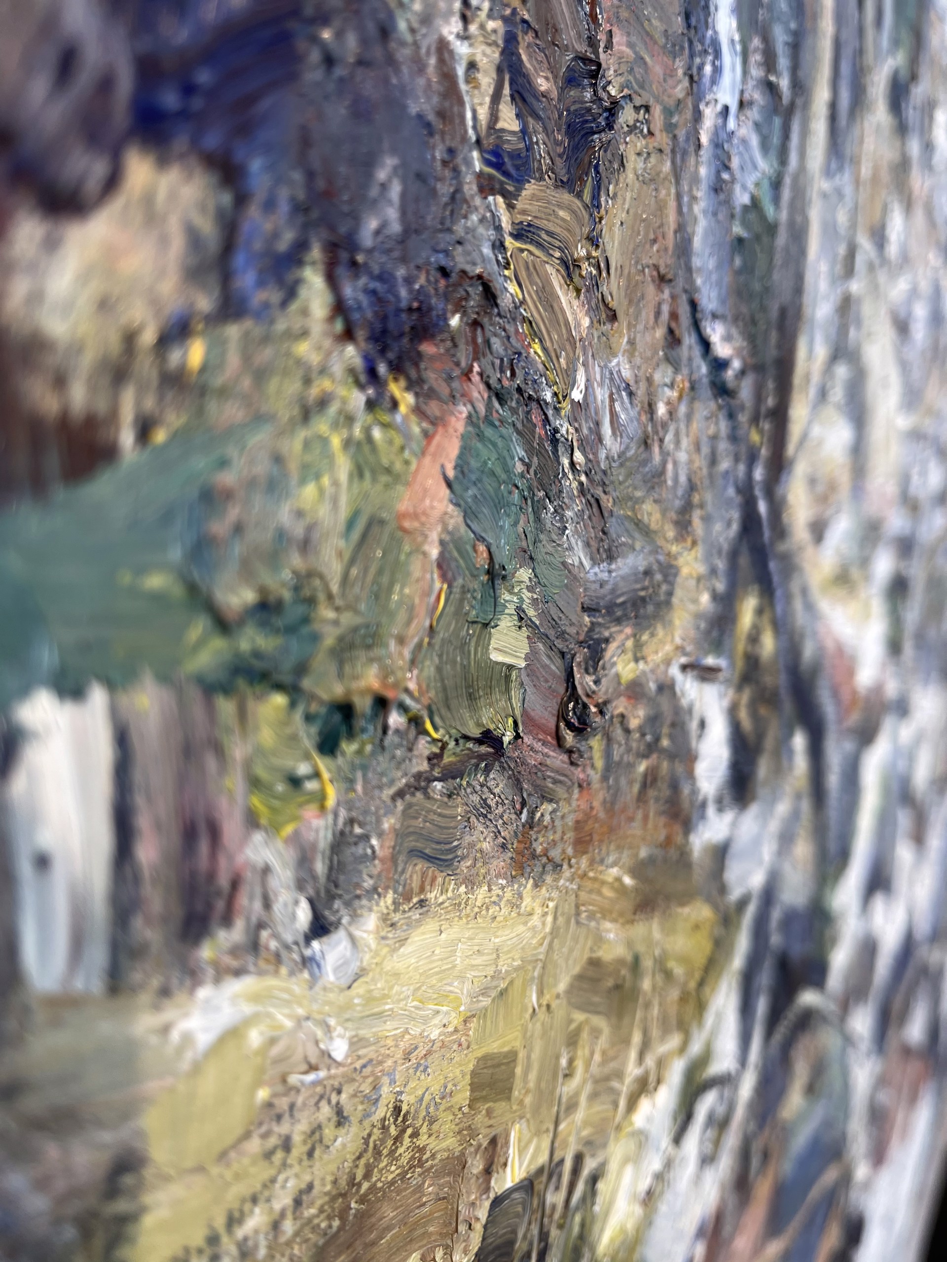 A painting of rocks and trees in the woods.