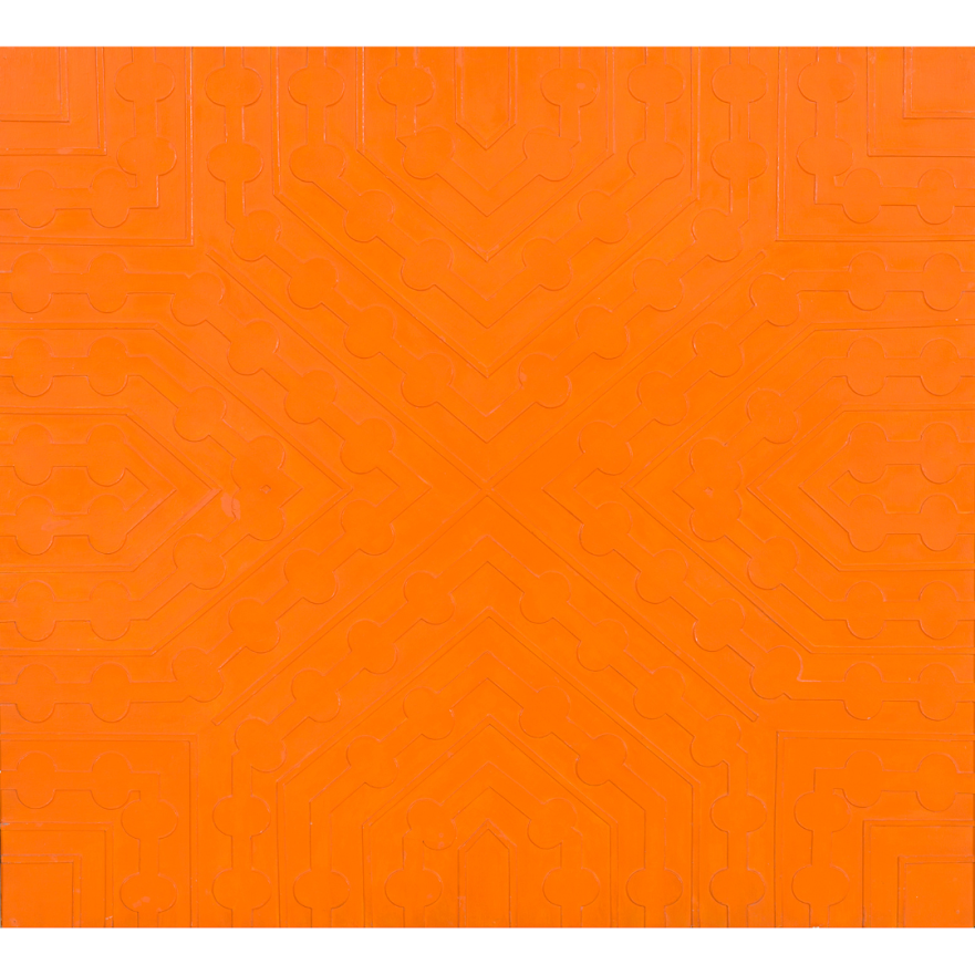 A close up of an orange floor tile with a pattern on it.