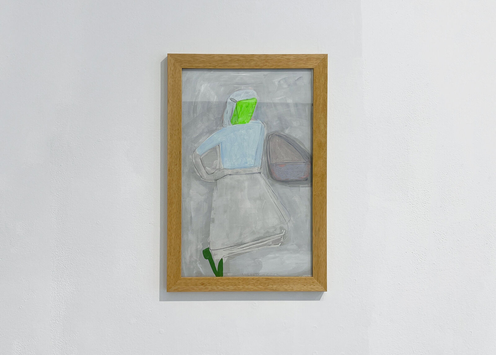A stylized figure with a bright green face stands against a textured grey background, holding a brown bag.