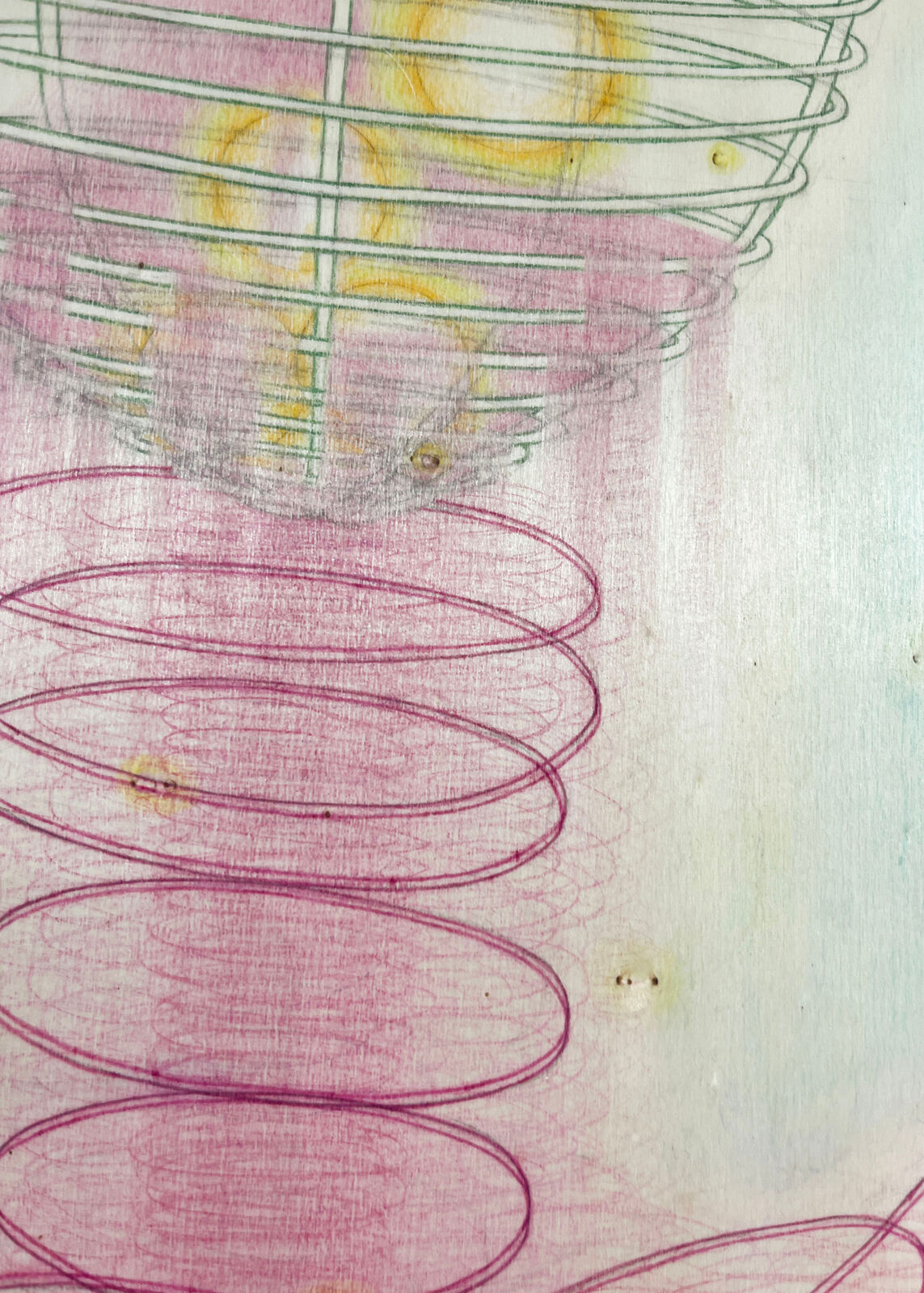 A surreal composition of a wire basket resting on a spring-like structure against a soft pastel background.