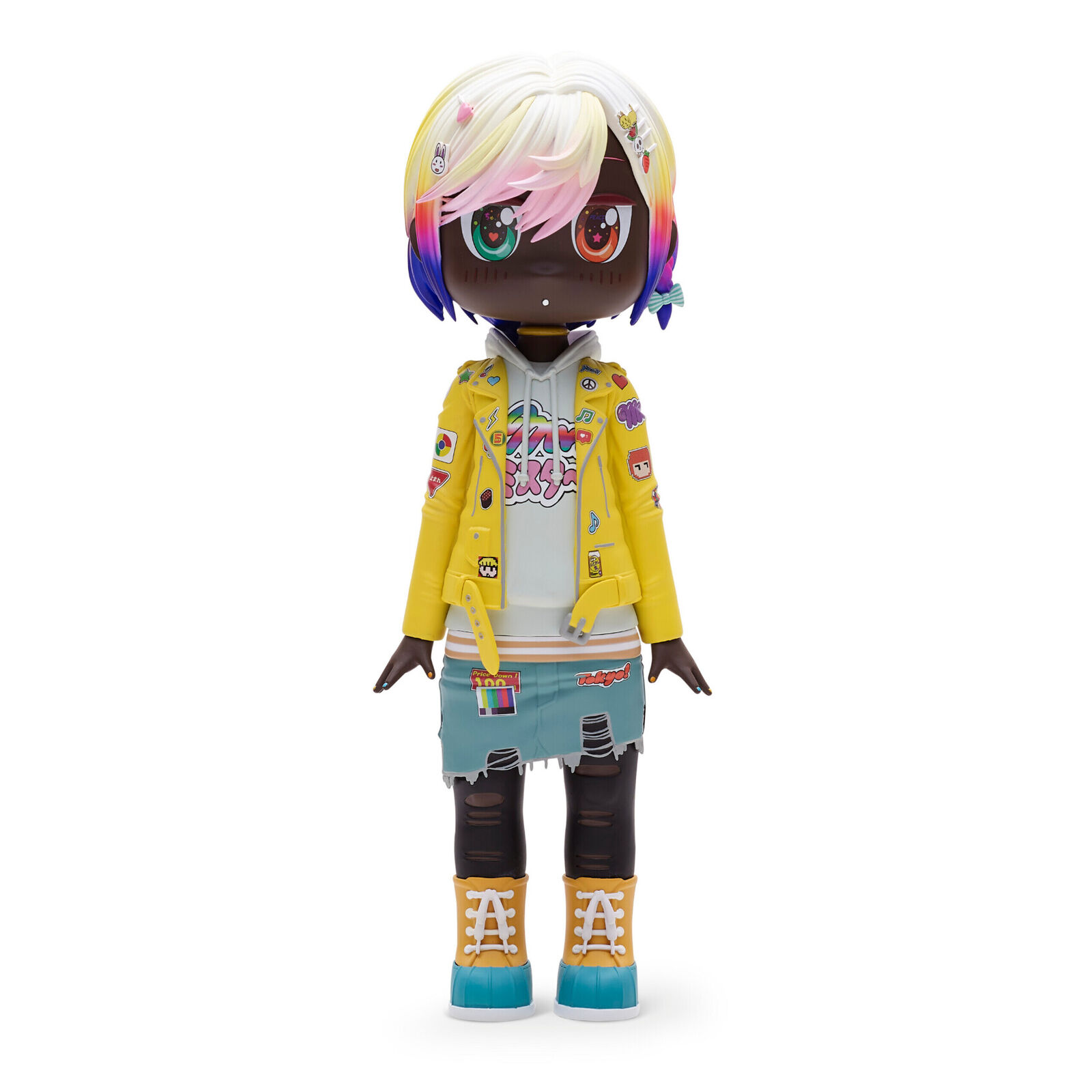 A doll with a yellow jacket and blue shorts.