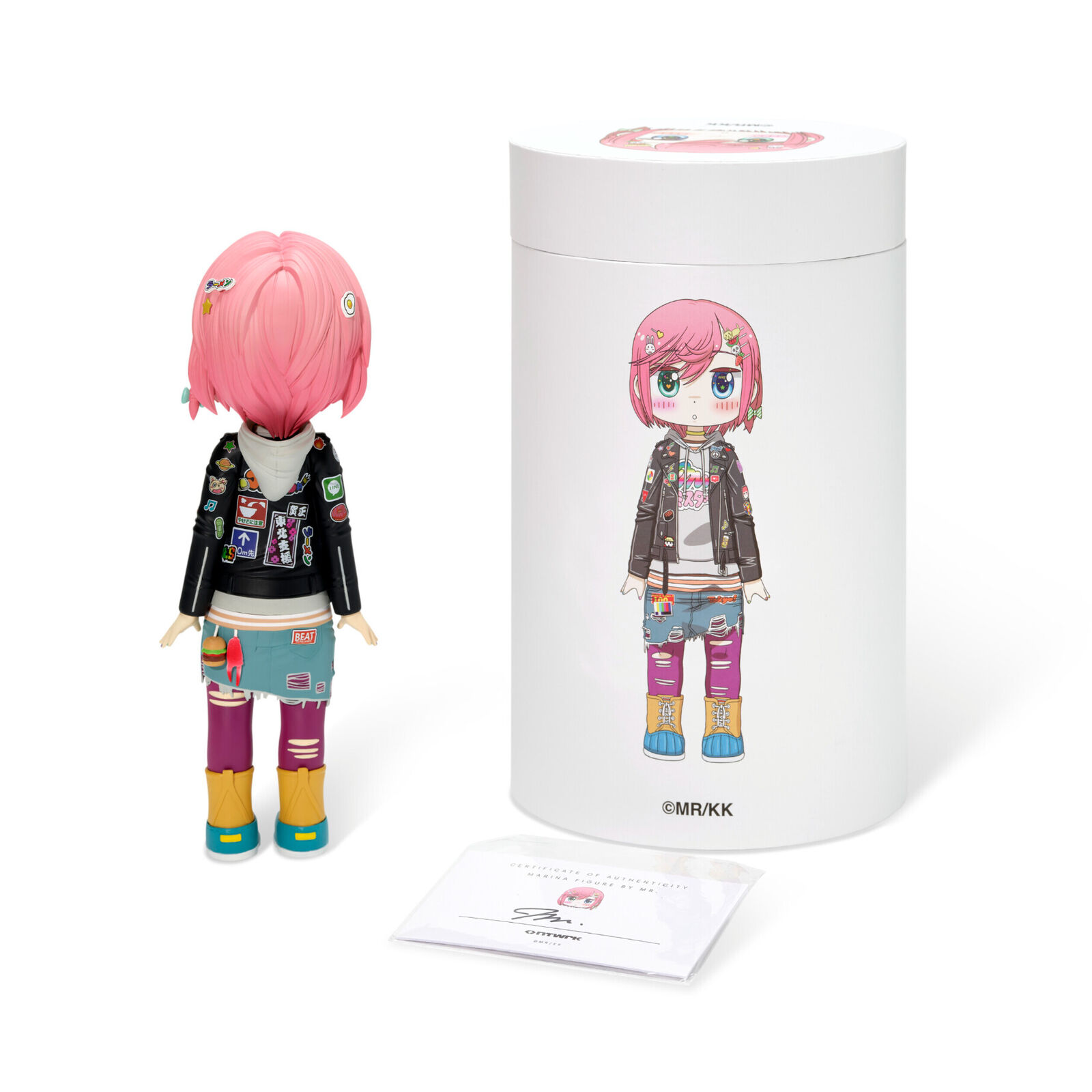 A doll with pink hair wearing a black jacket and jeans.