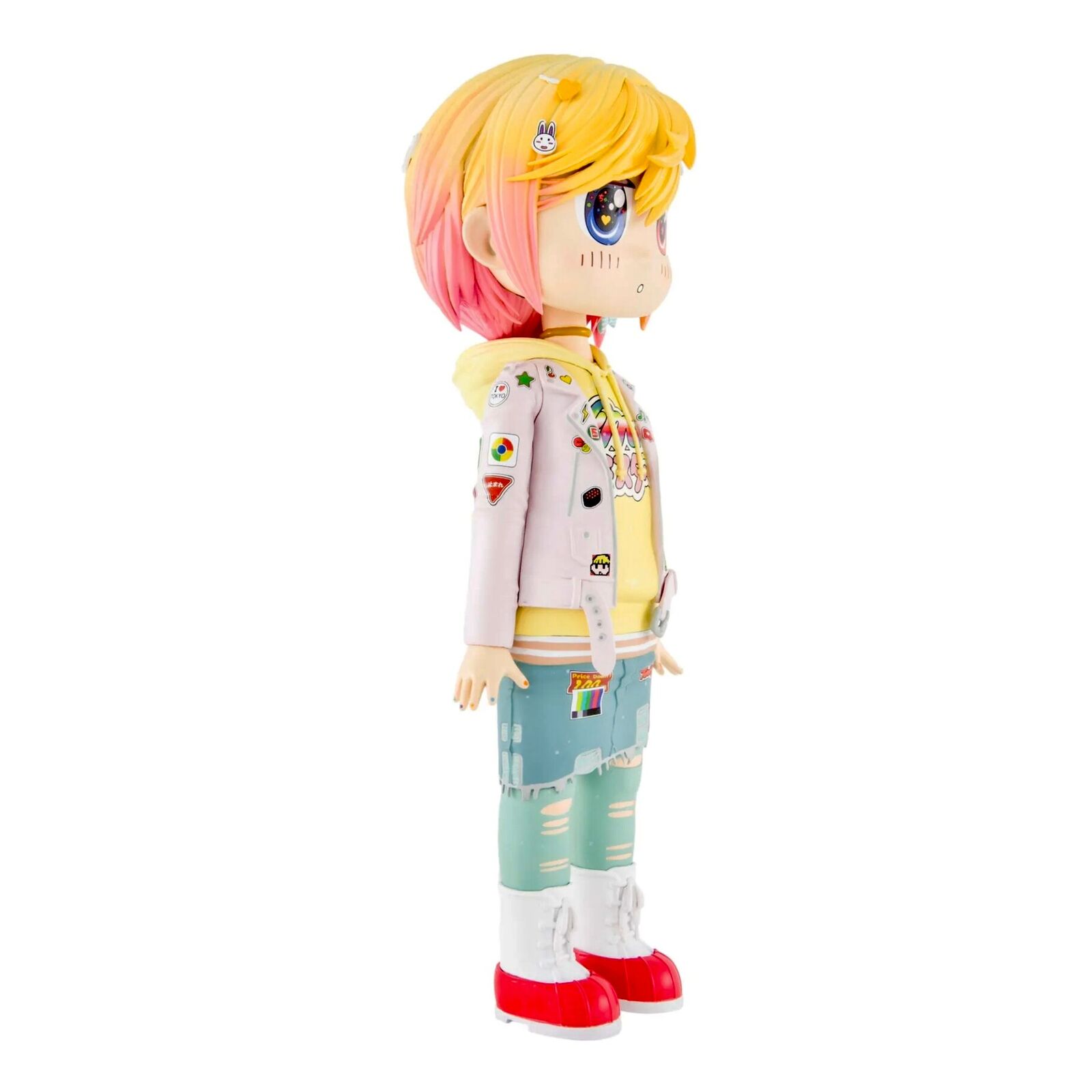 A doll with blonde hair wearing a white jacket and blue jeans.