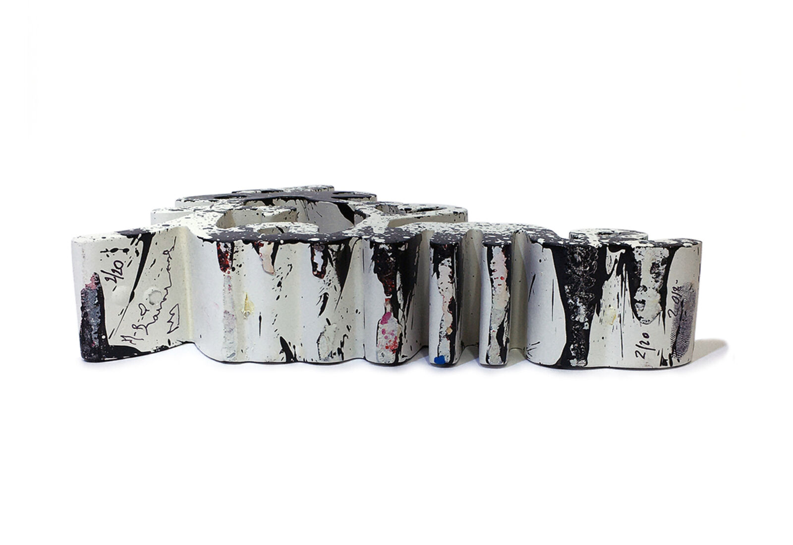 A black and white sculpture of the word love on a white background.