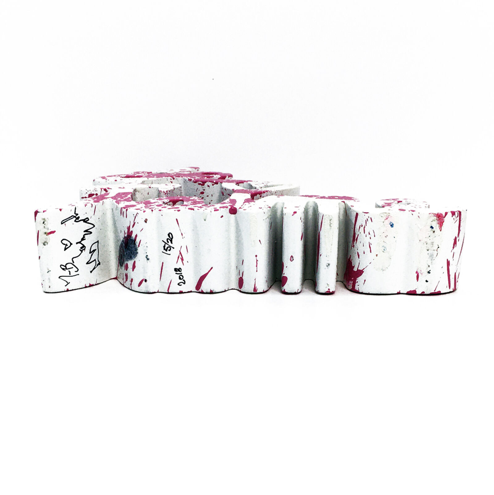 A pink and white wooden sign that says "love" on a white background.