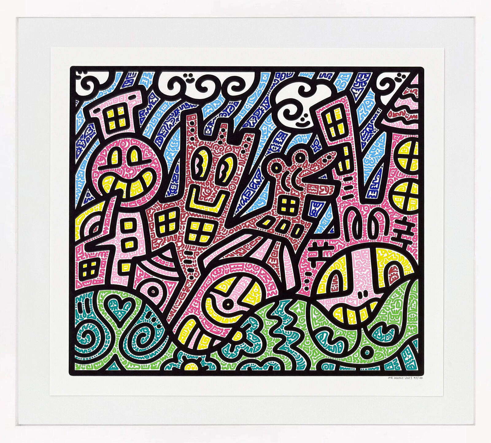 A picture of a colorful abstract painting in a white frame.