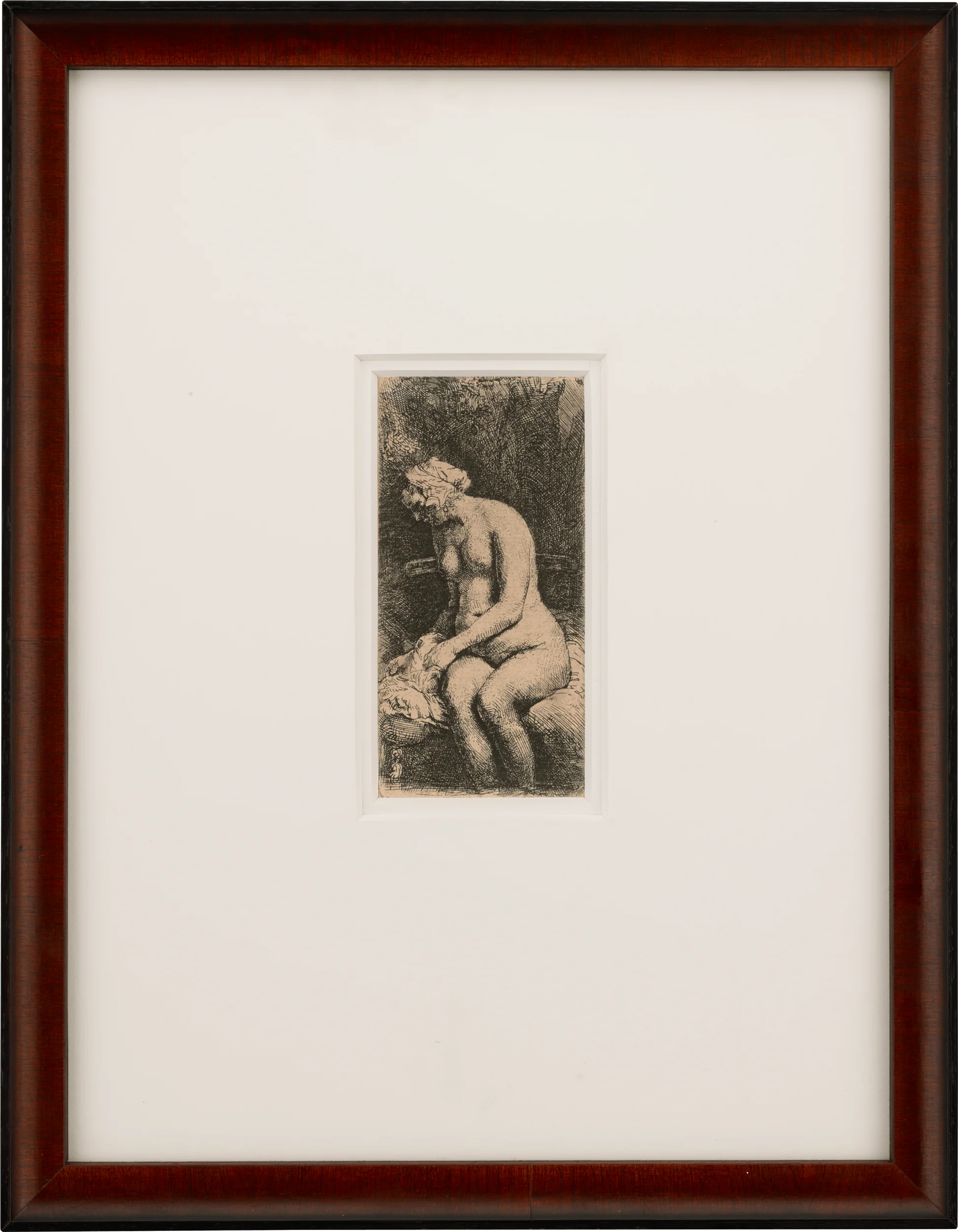 A dramatic etching of a seated nude figure in deep shadow.
