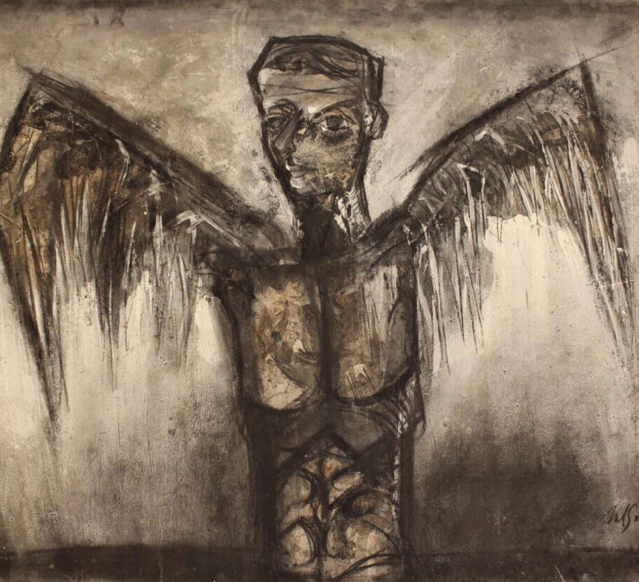 A drawing of an angel with wings on a wall.