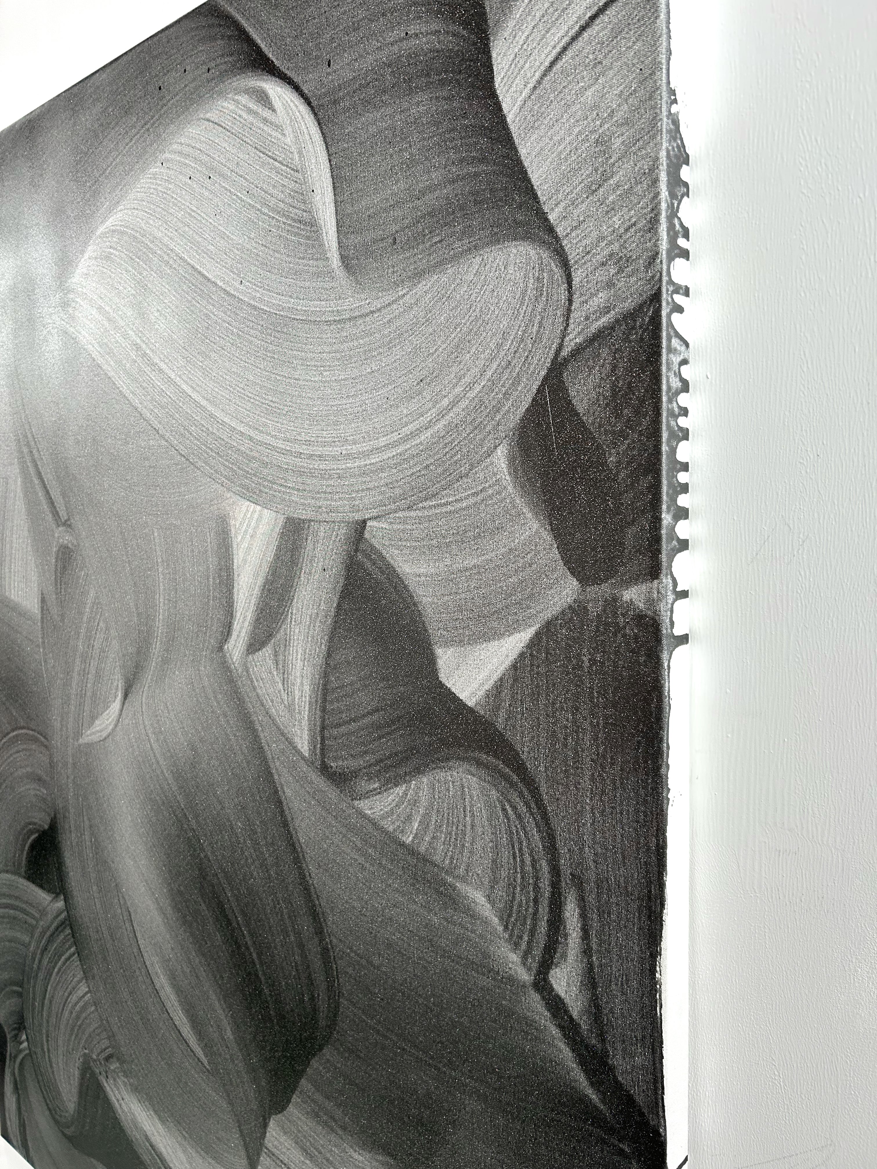 A black and white drawing of a woman's face.