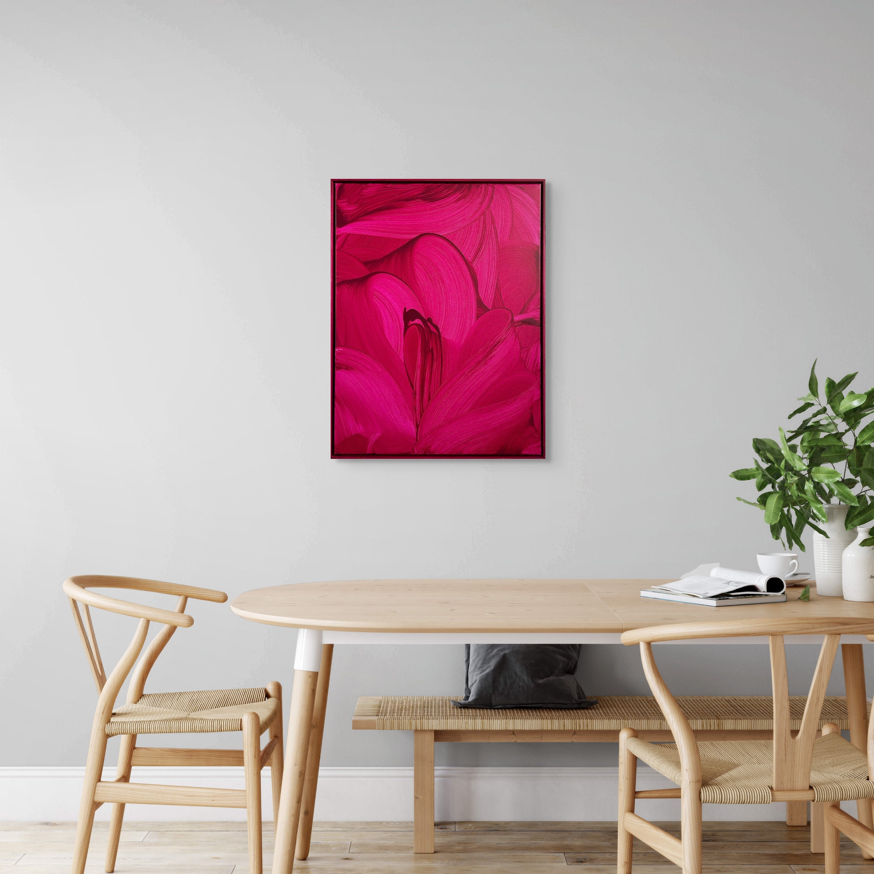 A painting of a pink flower on a red background.