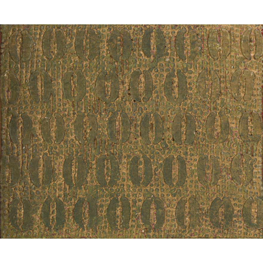 A green rug with a pattern of circles on it.