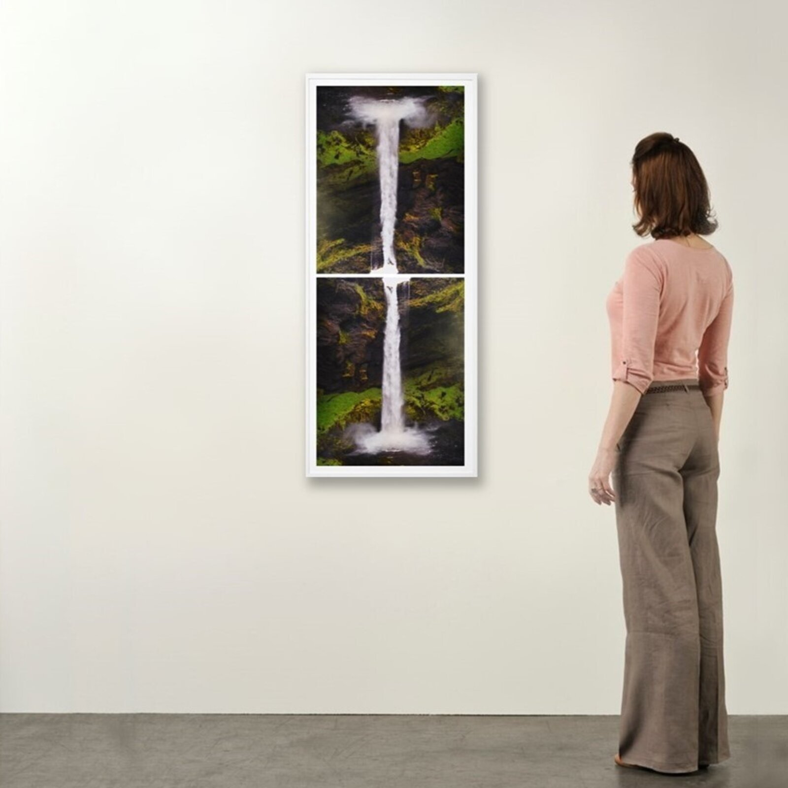 A split-panel framed artwork of a waterfall cascading over mossy rocks.