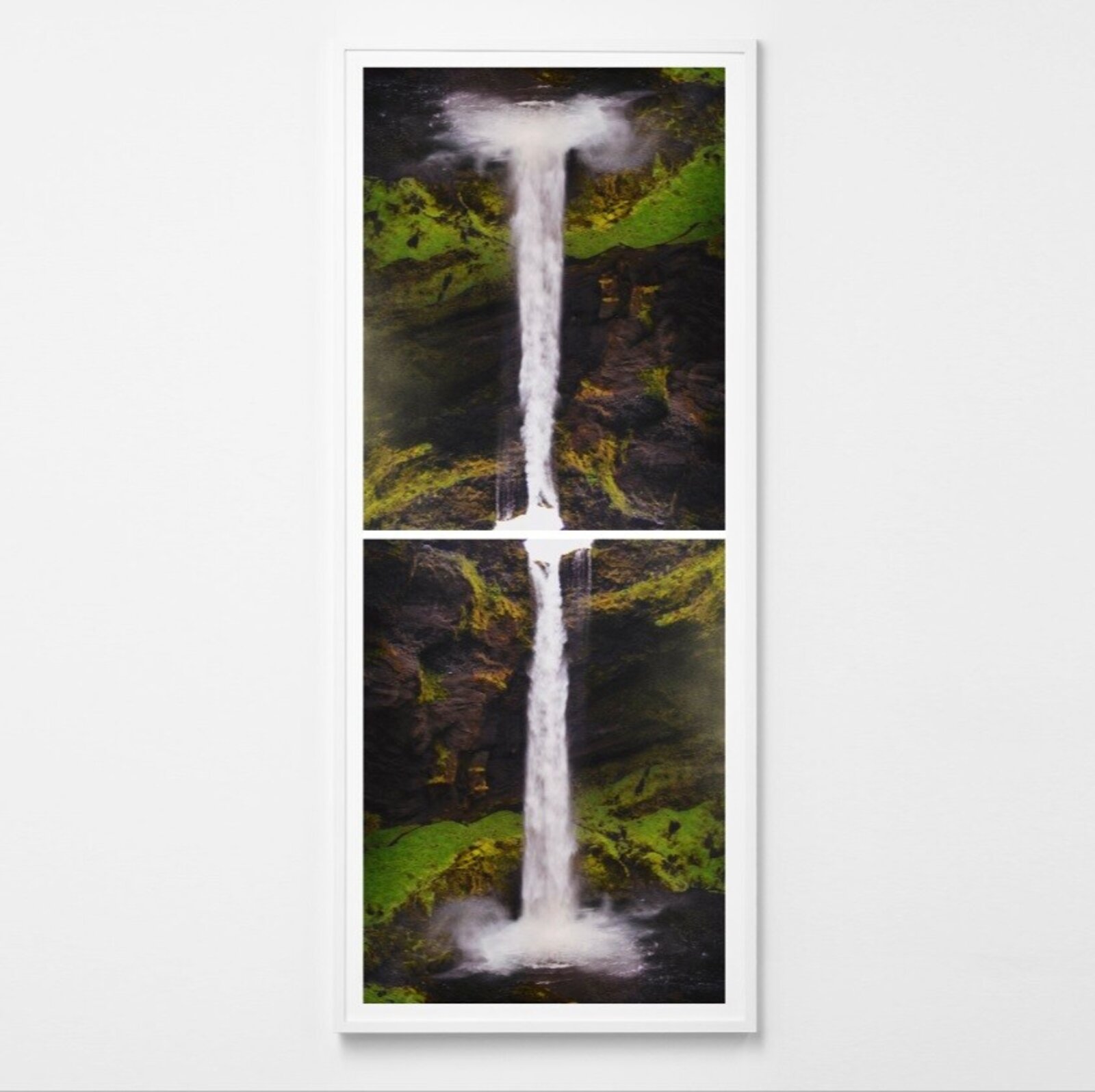 A split-panel framed artwork of a waterfall cascading over mossy rocks.
