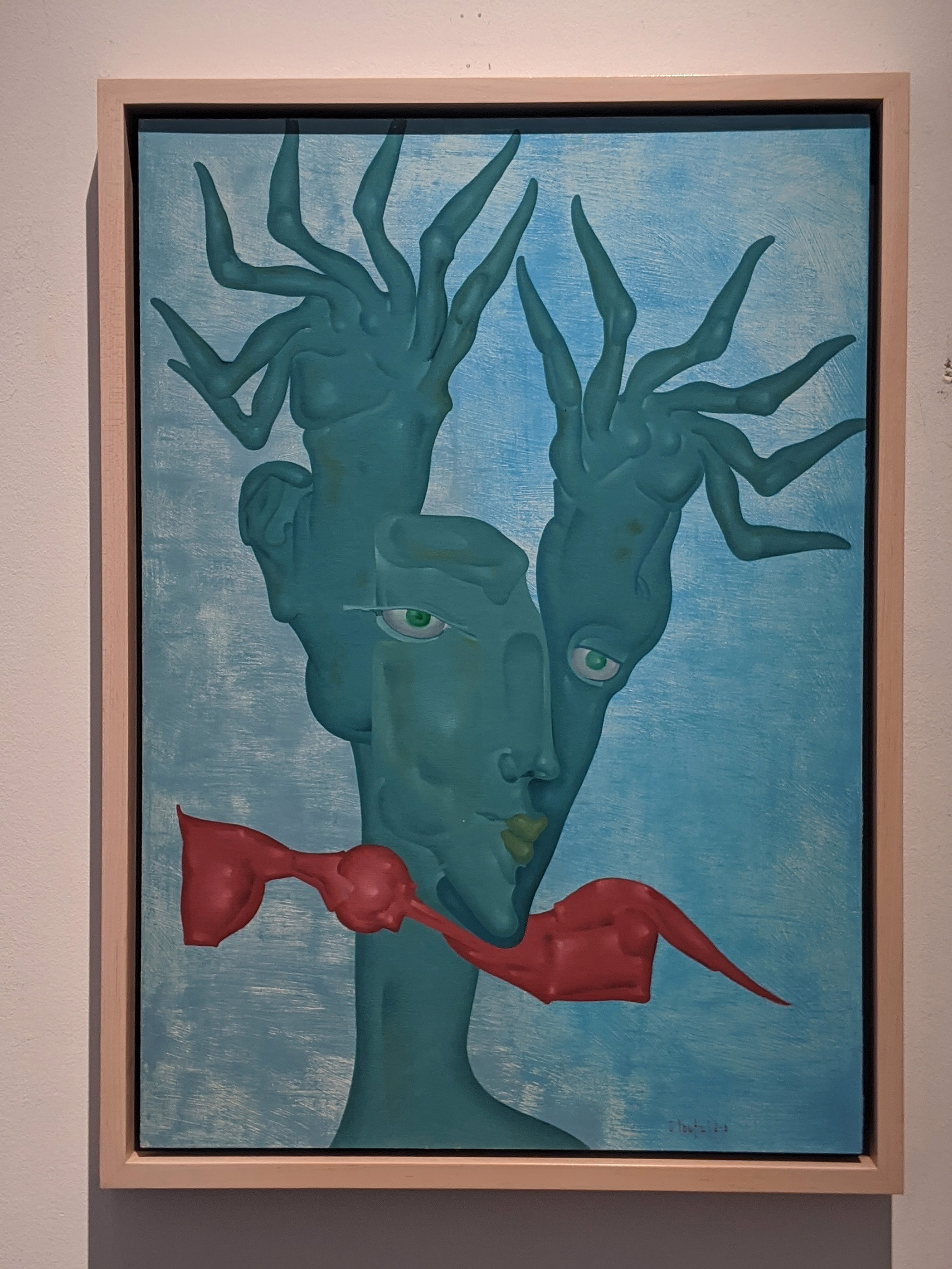 A painting of a woman with a red scarf on her head.