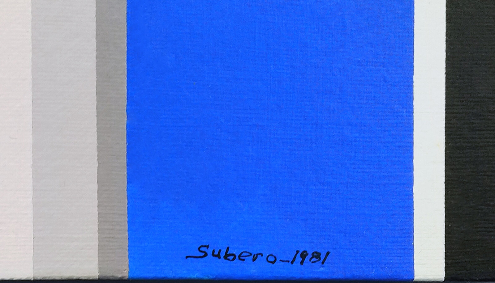 A painting of blue, black, white, and red squares.