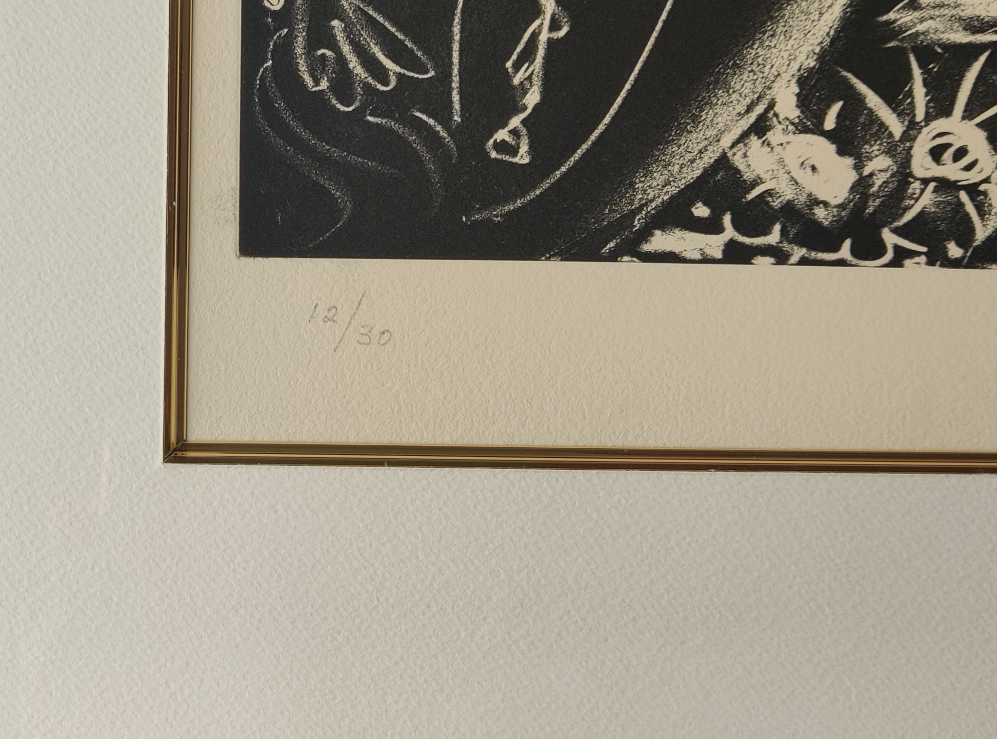 A black and white drawing of a man on a horse.