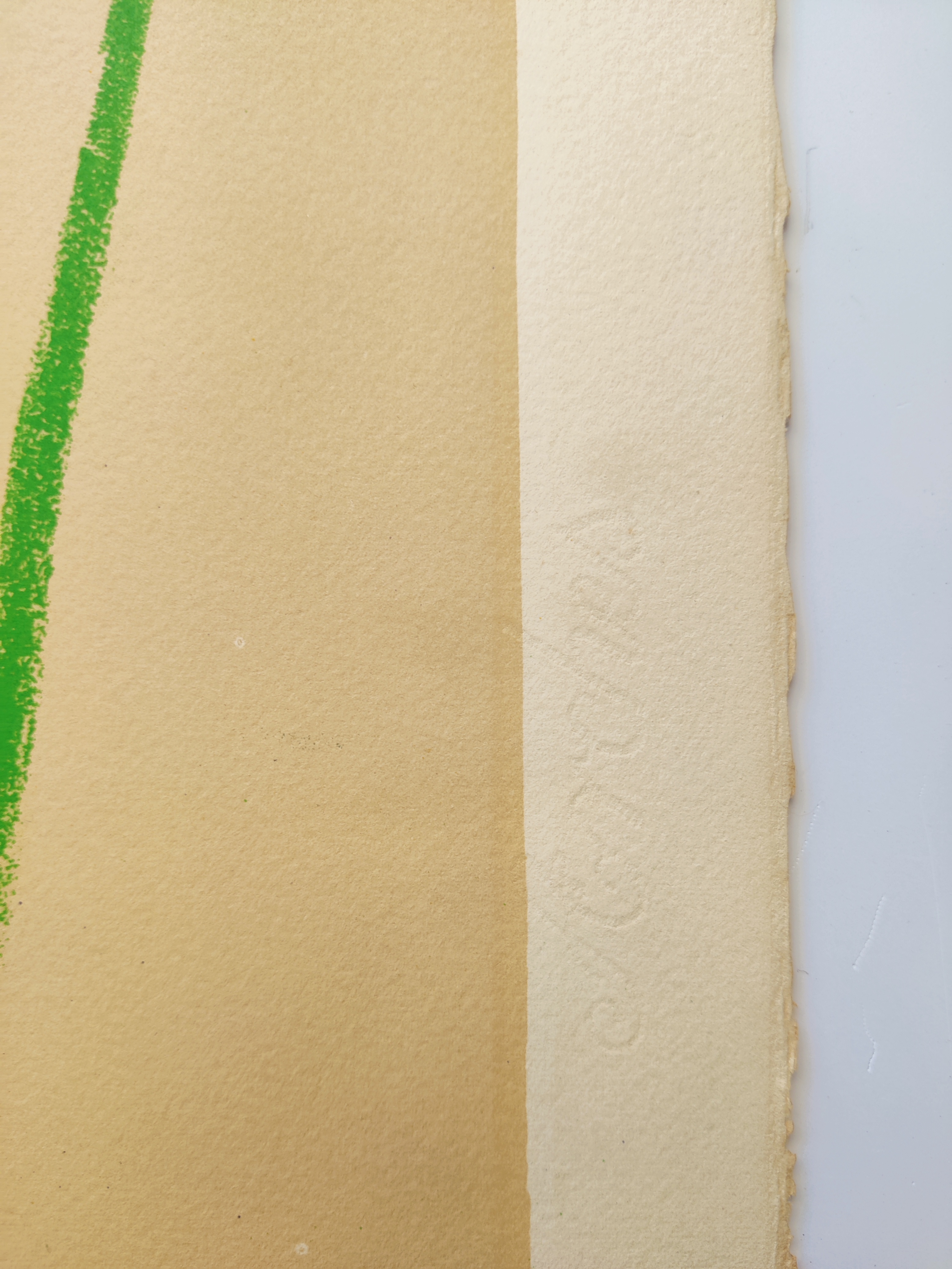 A drawing of a woman's face on a piece of paper.