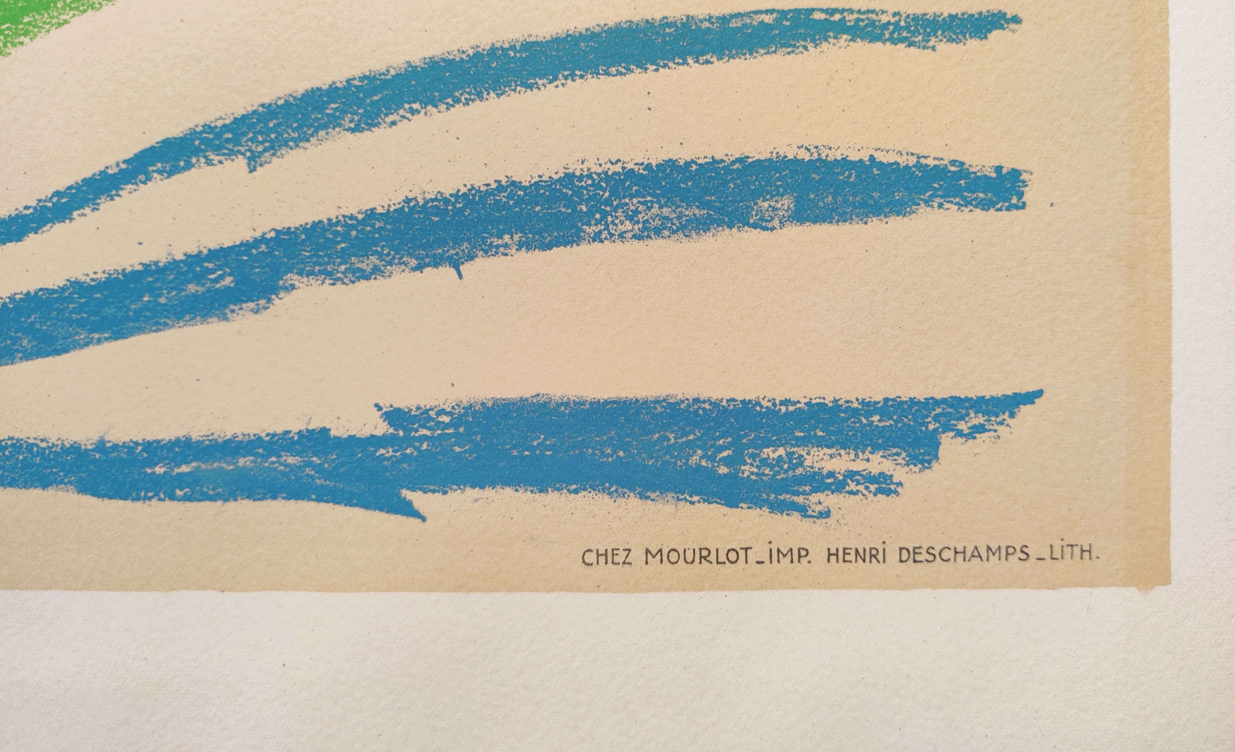 A drawing of a woman's face on a piece of paper.