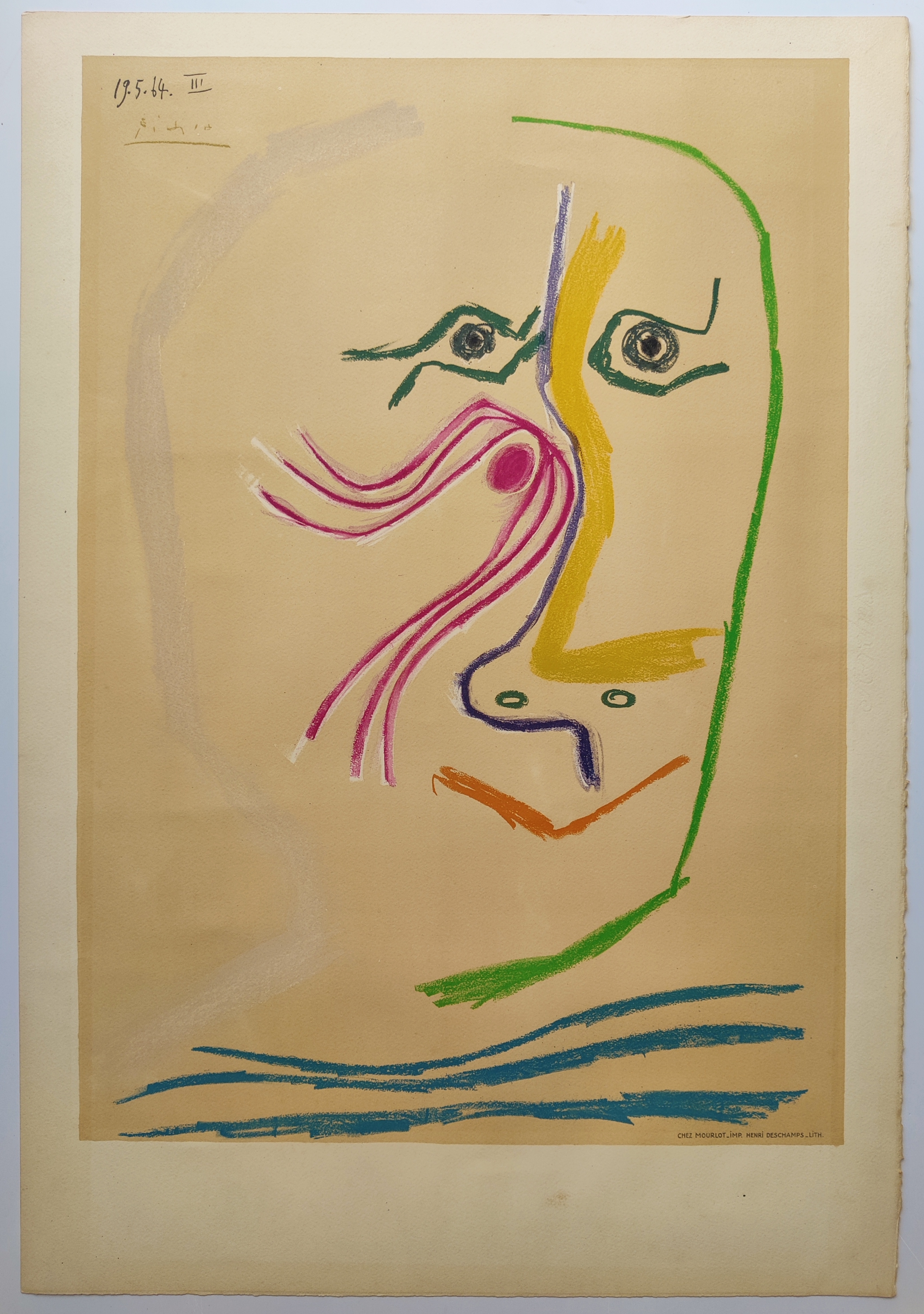 A drawing of a woman's face on a piece of paper.