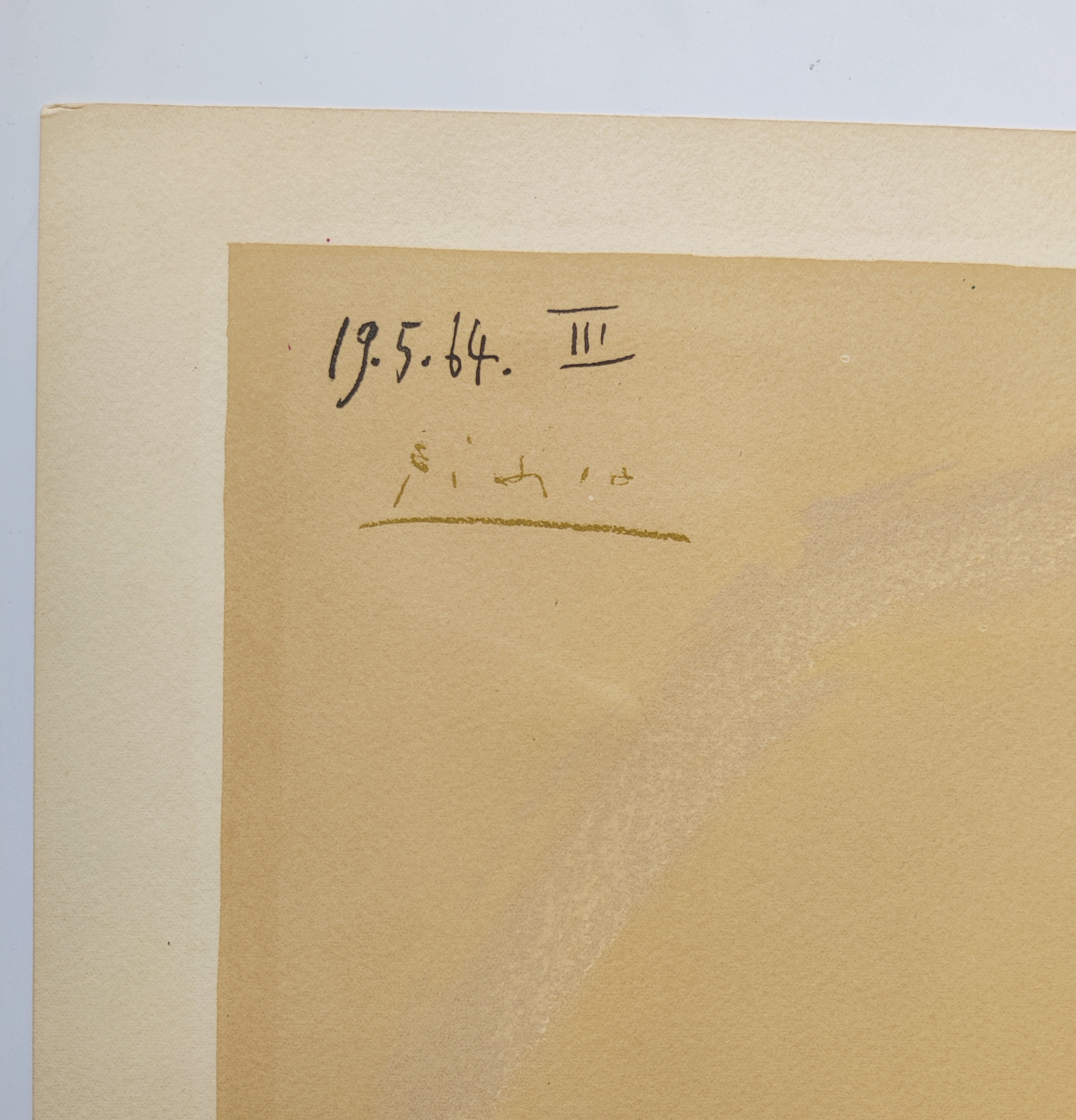 A drawing of a woman's face on a piece of paper.