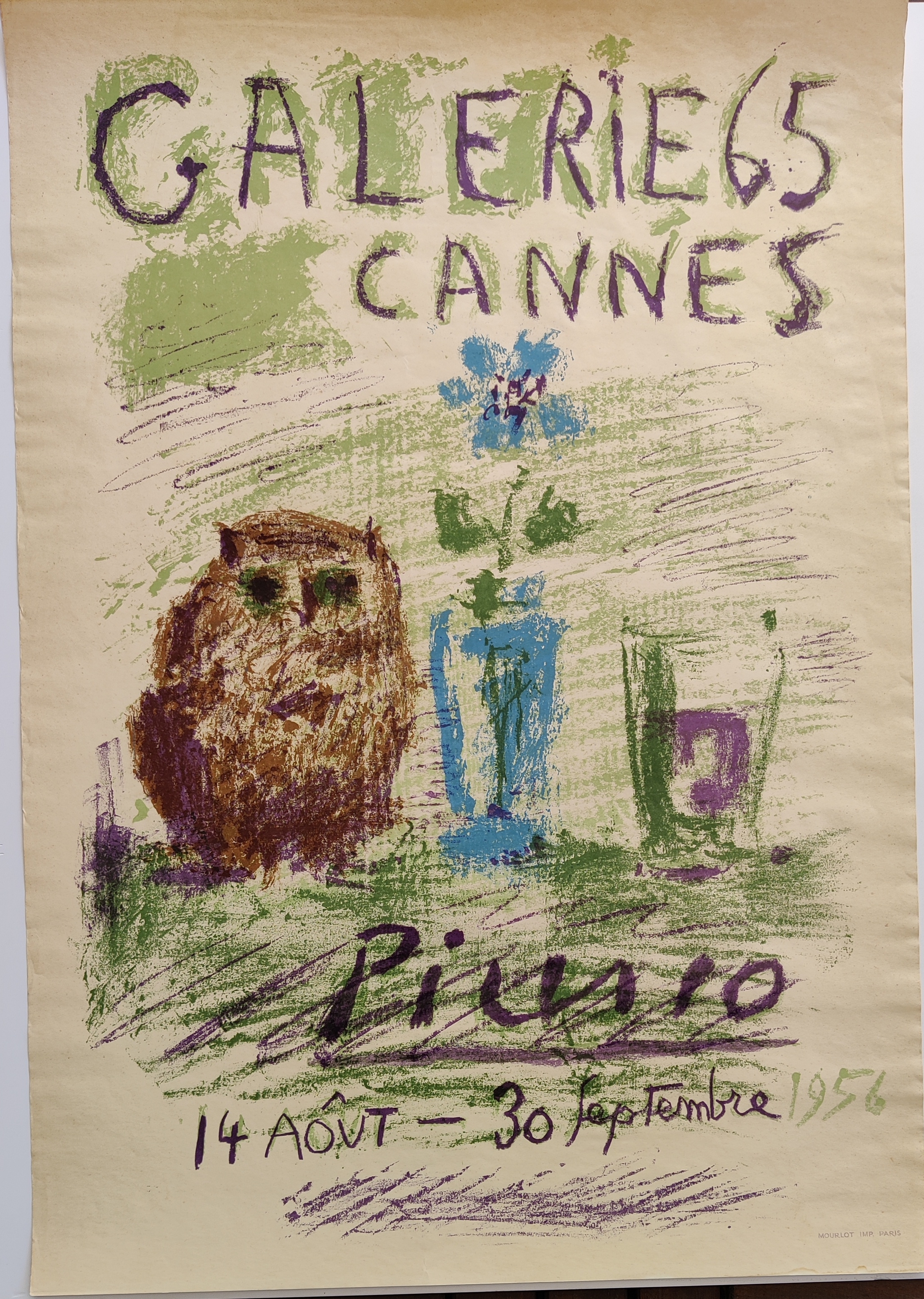 A poster with a drawing of an owl sitting on a table.