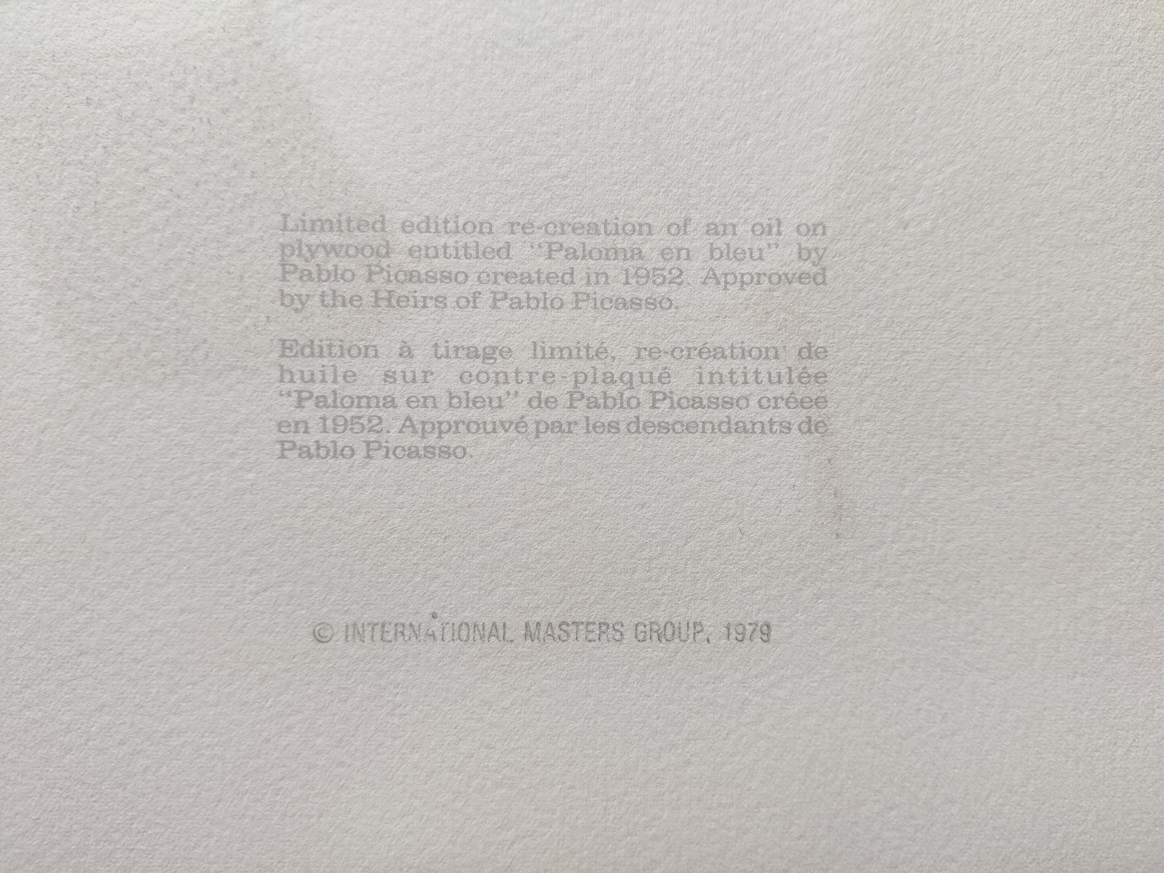 A painting of a woman holding a cat in her arms.