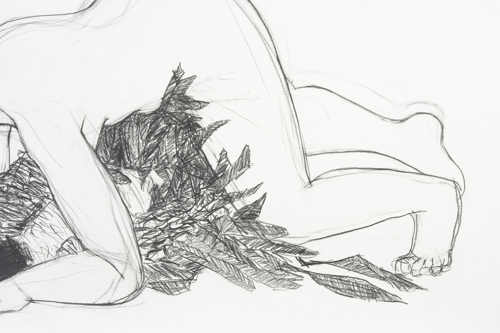 A drawing of a man and a woman laying on the ground.