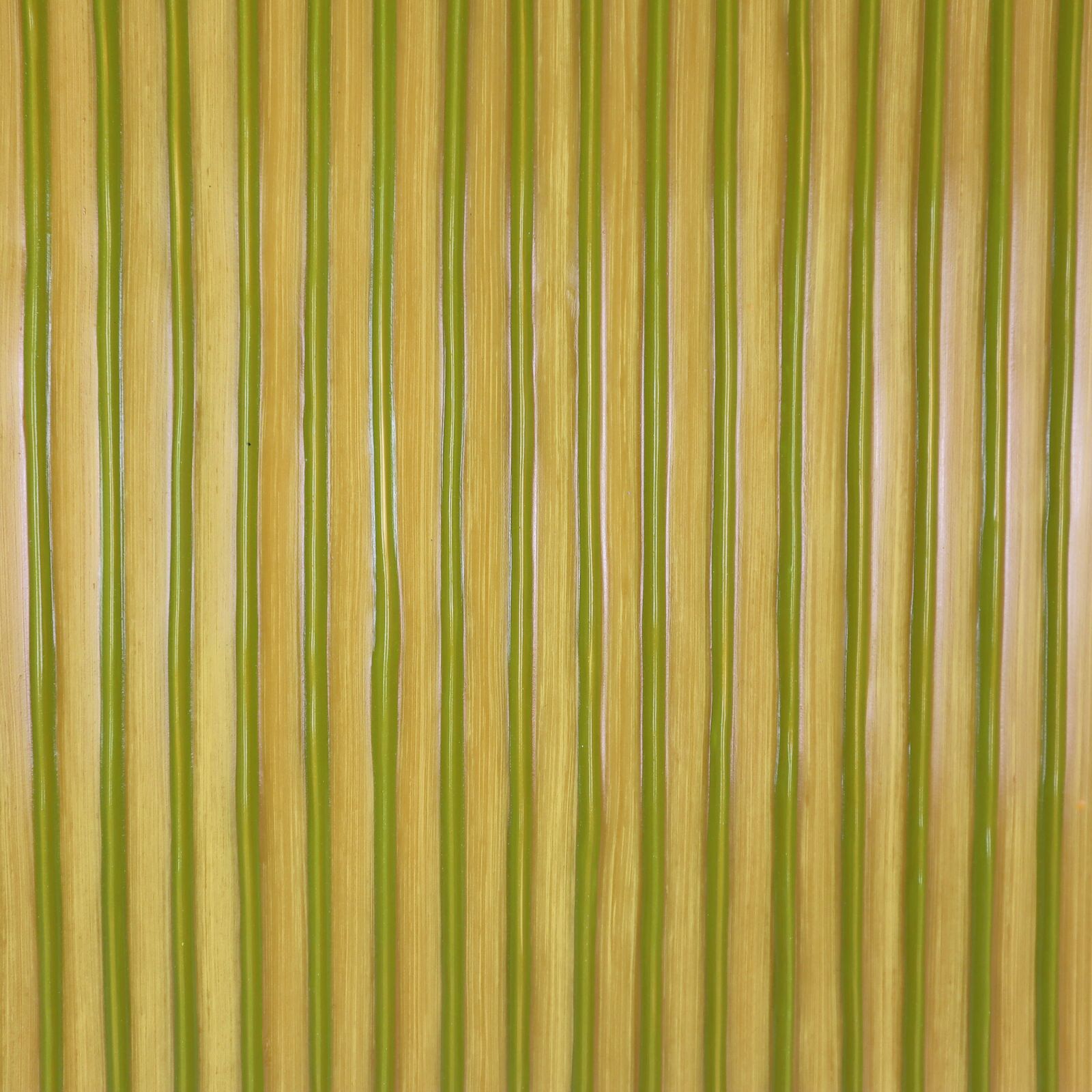 Two pieces of yellow and blue paper on a white surface.