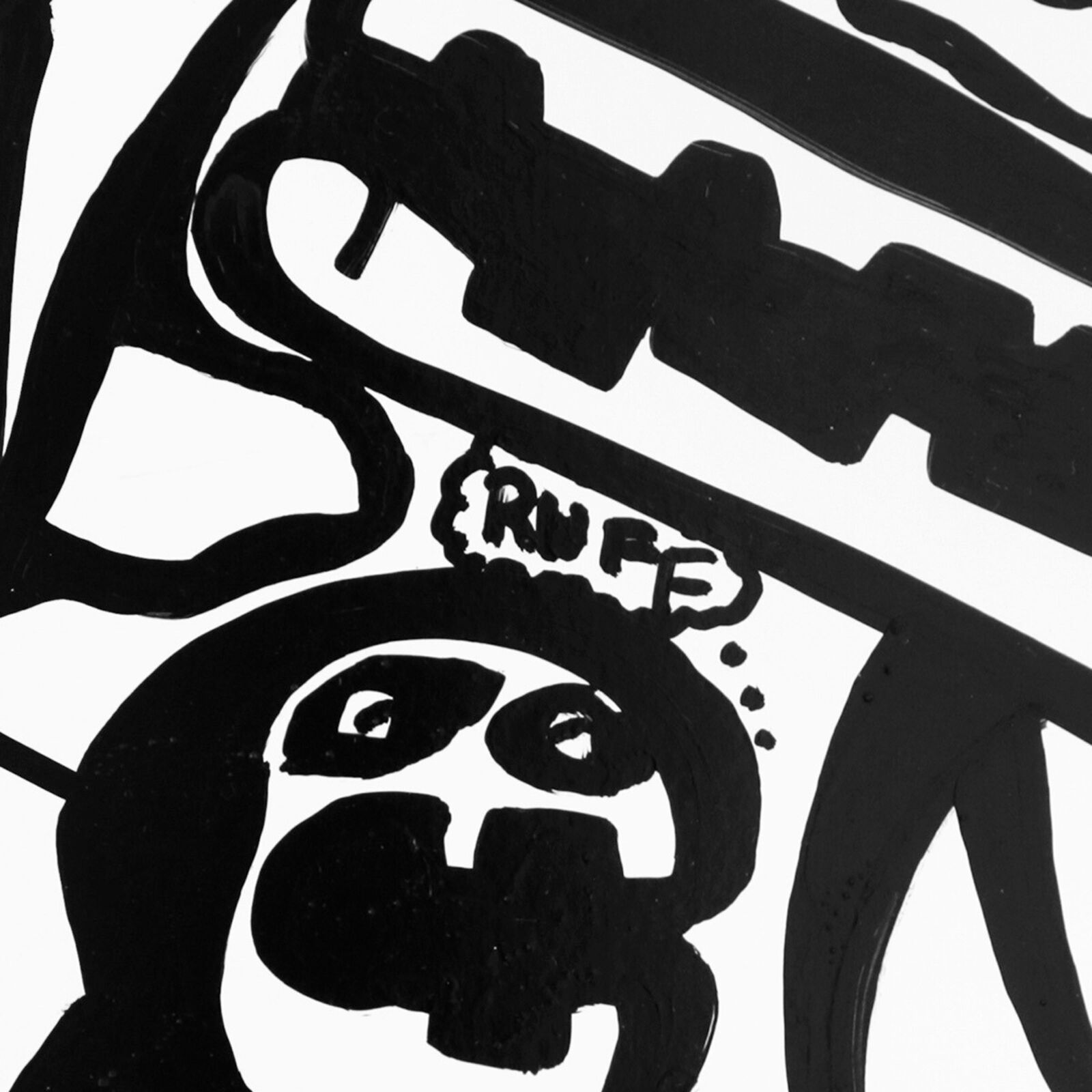 A wooden bench sitting in front of a white wall.