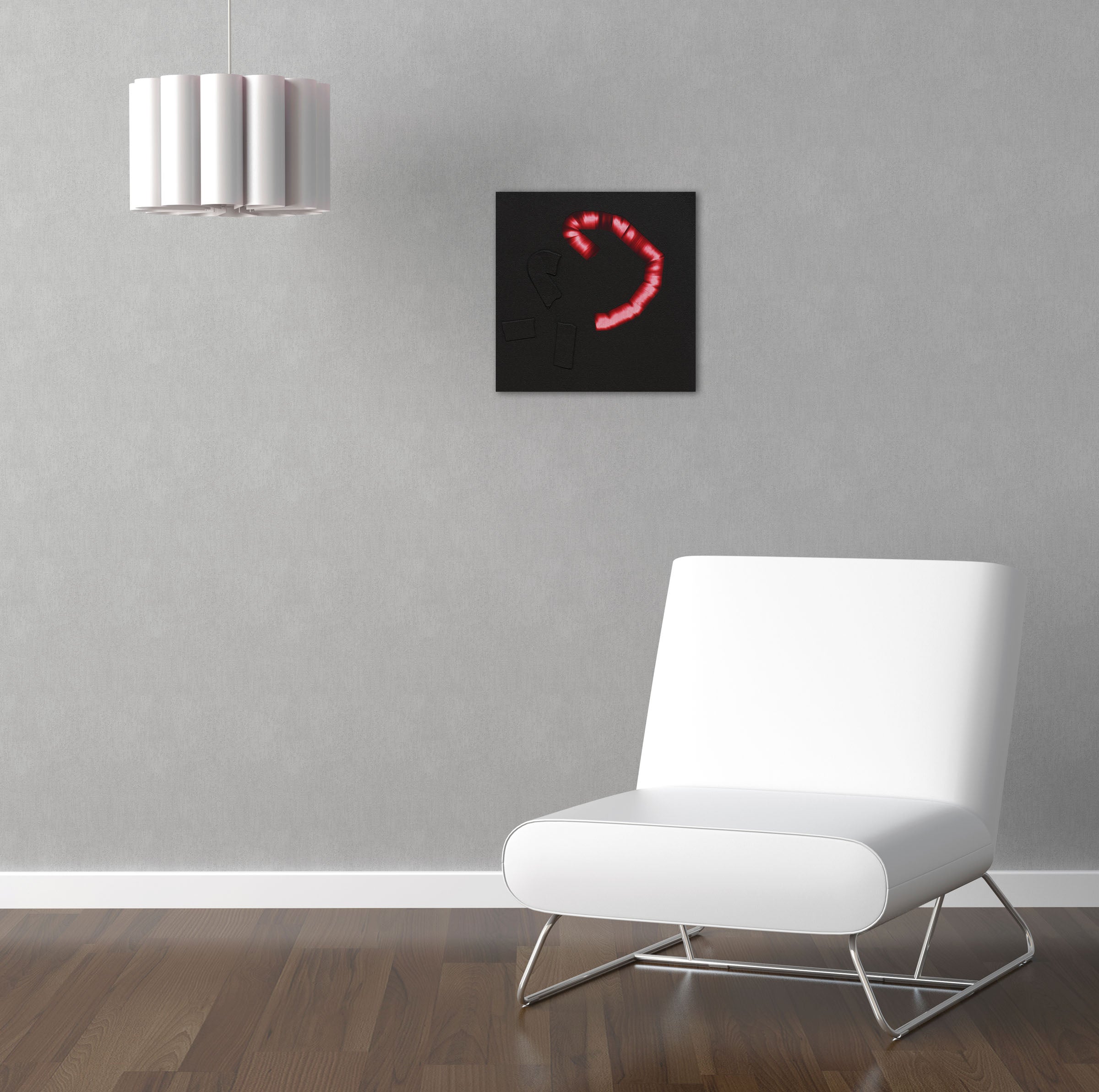 A red candy cane on a black background. 
