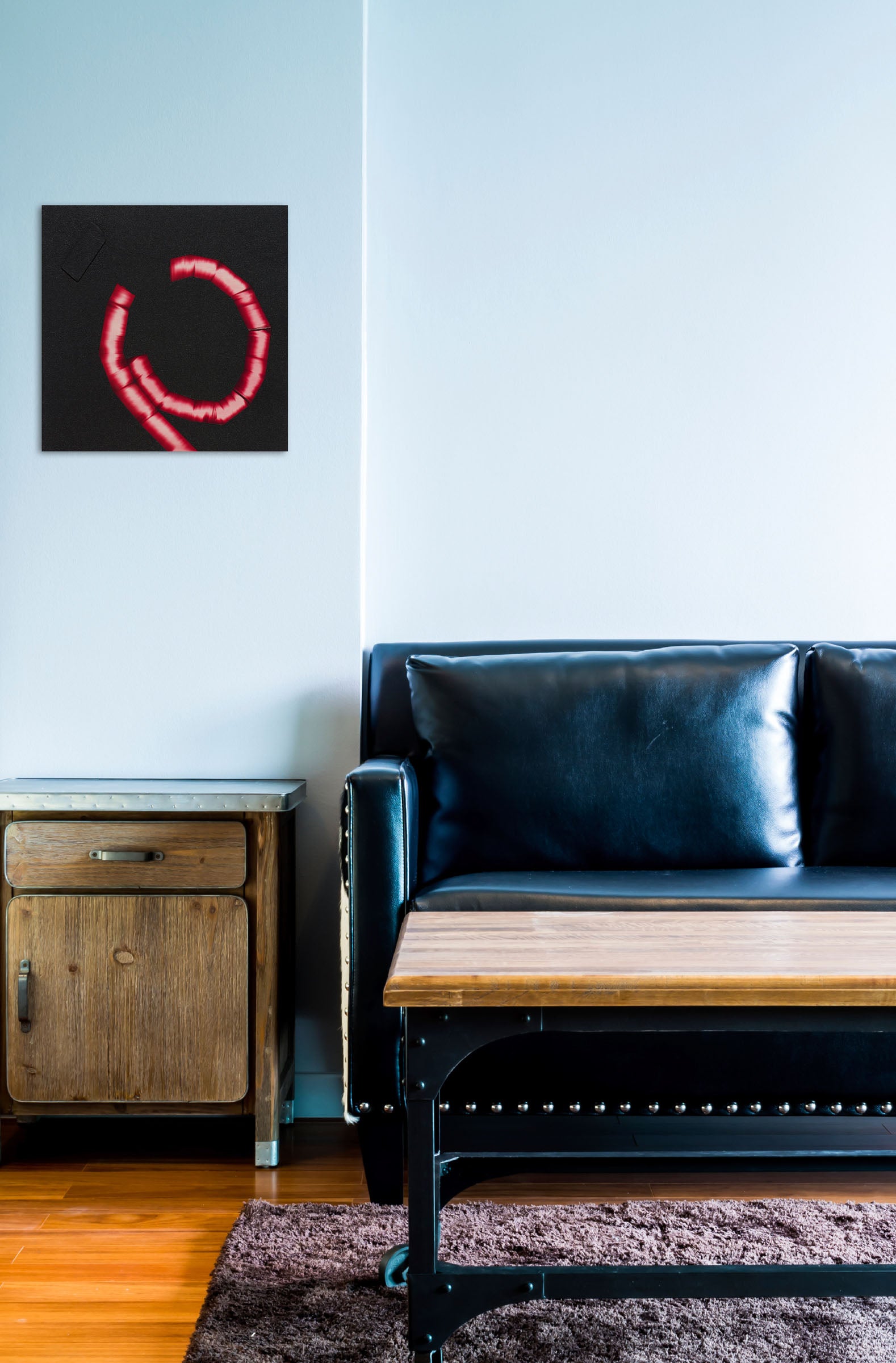 A red letter C on a black background. 