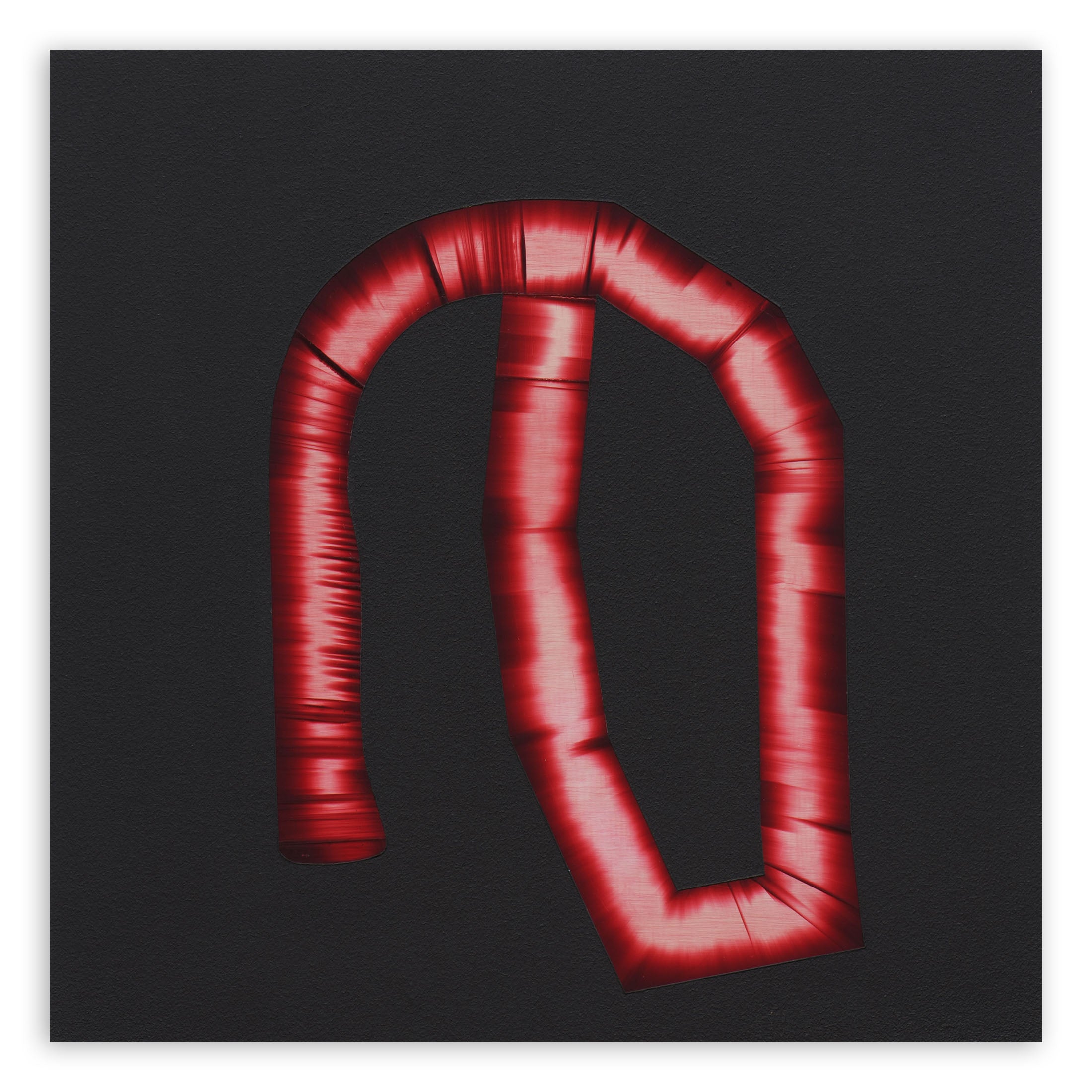 A red letter D on a black background.