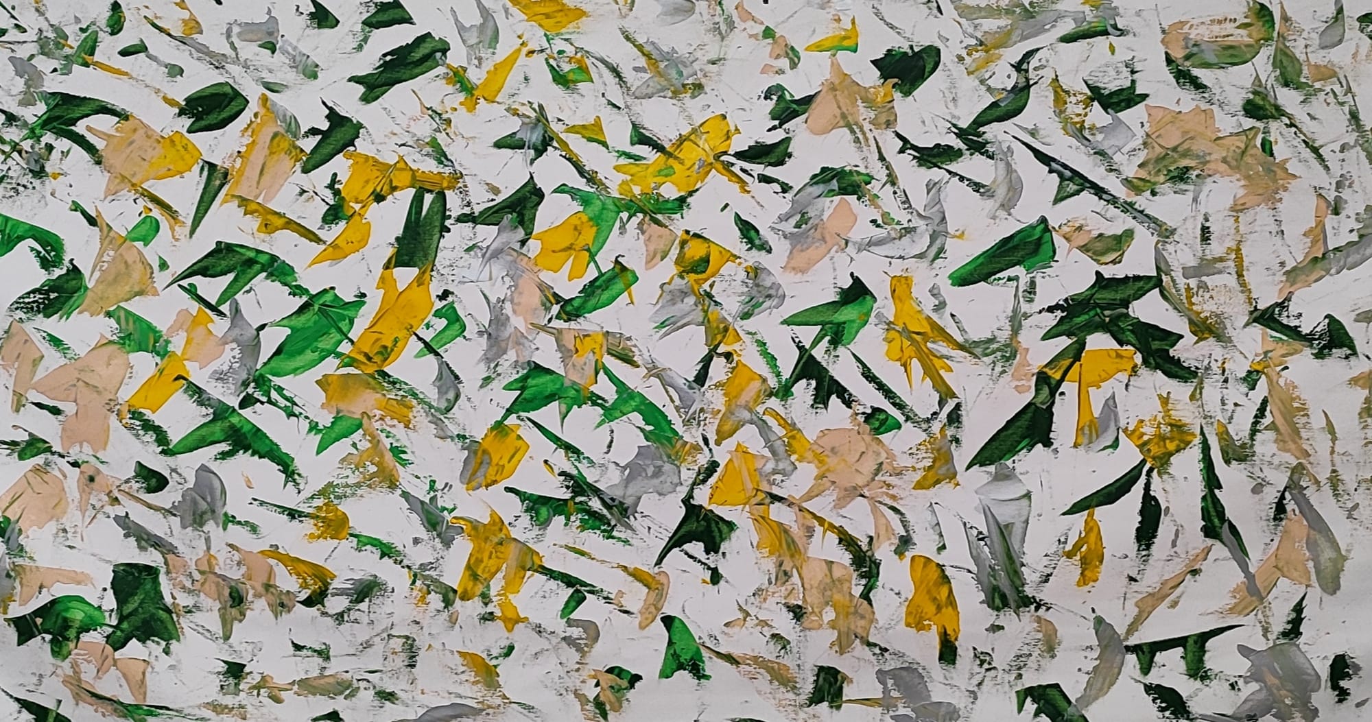 A painting of yellow and green leaves on a white background.