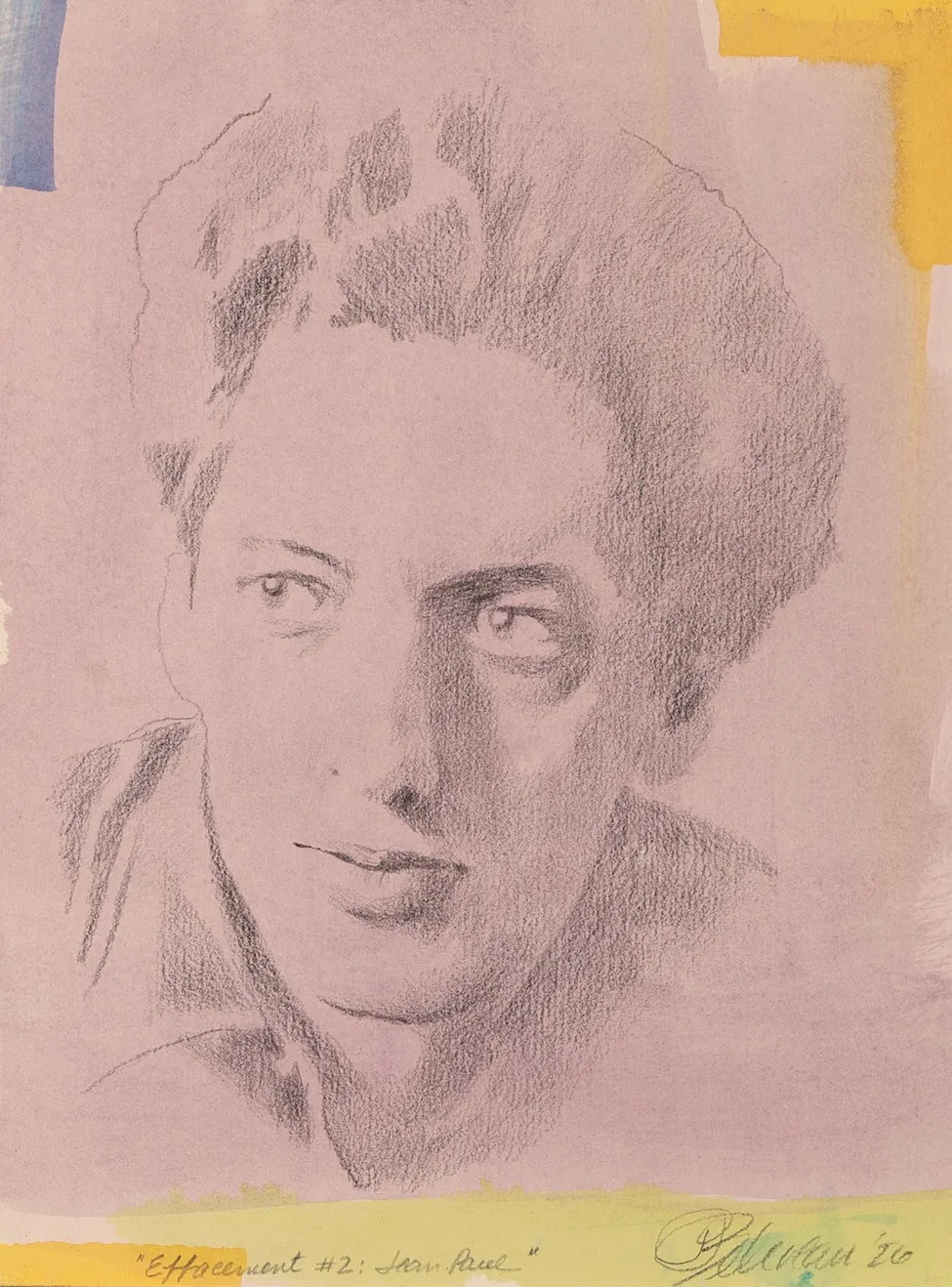 A drawing of a woman's face on a piece of paper.