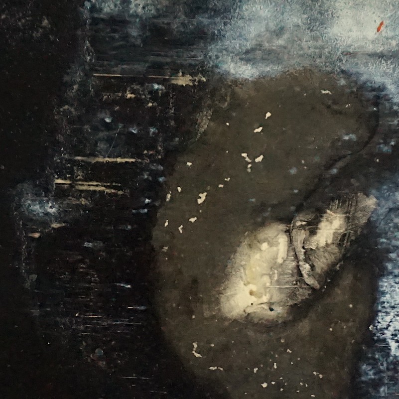 A dark, textured abstract composition featuring a central organic shape with peeling layers against a rough background.