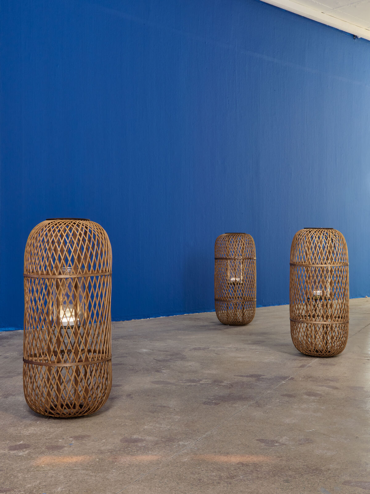 Artwork by Paul Maheke, A Flesh Without The Memory of Its wound: The After, Made of Sound loop, paint and wicker lanterns 
