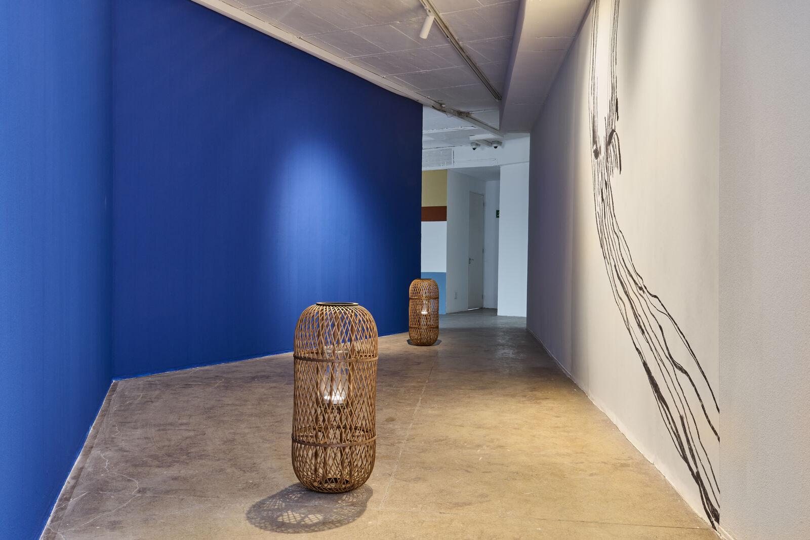 Artwork by Paul Maheke, A Flesh Without The Memory of Its wound: The After, Made of Sound loop, paint and wicker lanterns 