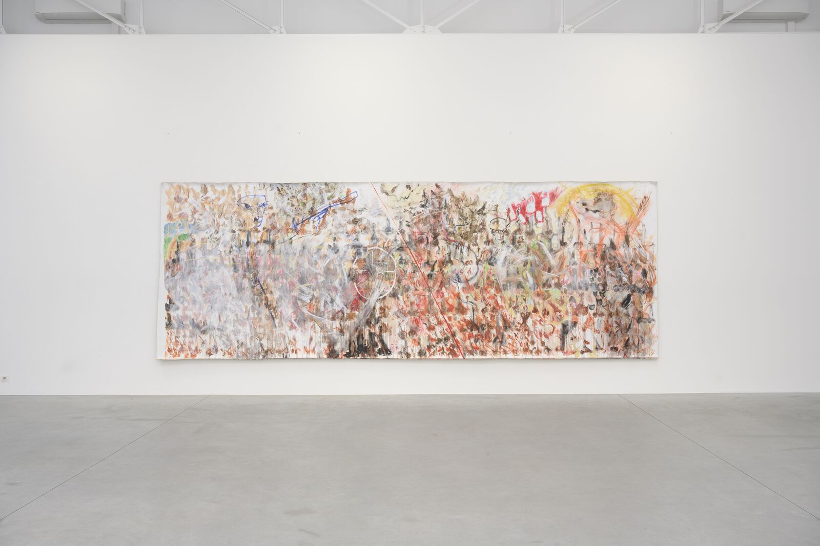 A large painting hanging on a wall in an empty room.