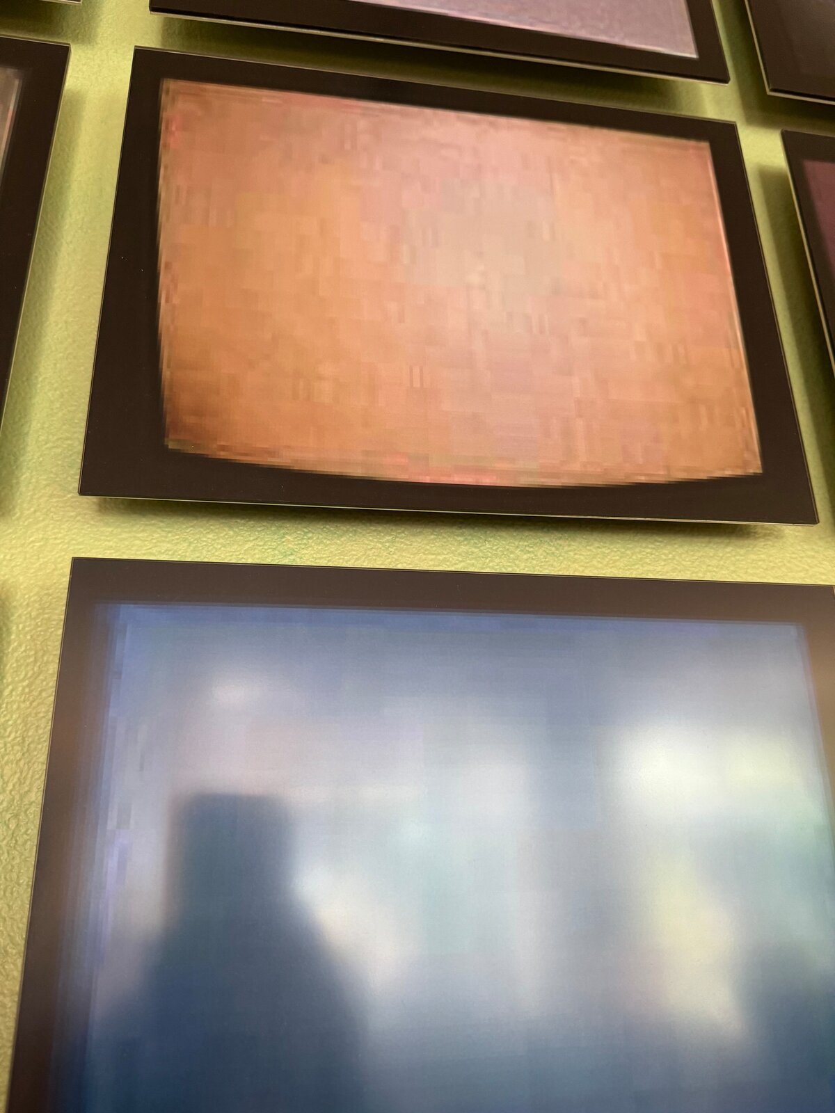 Artwork by Penelope Umbrico, Signals Still (TVs from Craigslist), 2008-2011, Made of 39 digital c-prints on metallic Kodak paper 