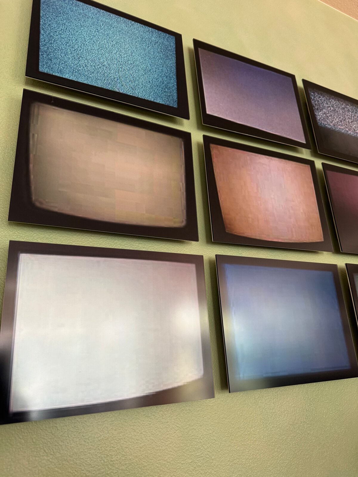 Artwork by Penelope Umbrico, Signals Still (TVs from Craigslist), 2008-2011, Made of 39 digital c-prints on metallic Kodak paper 