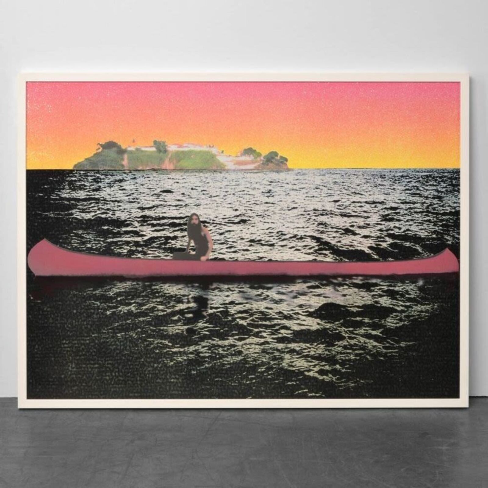 A woman standing in front of a painting on a wall.