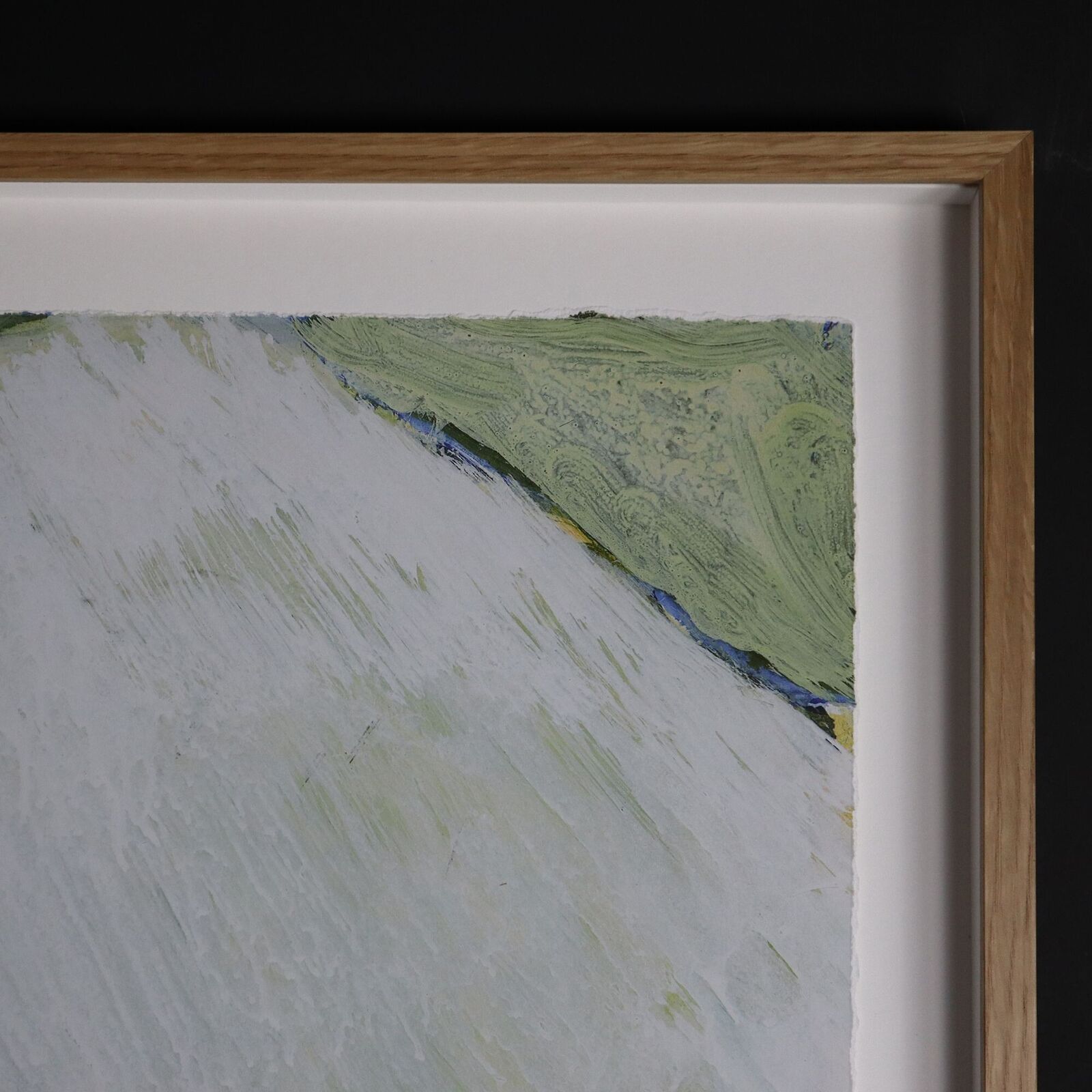 A painting of a person skiing down a snowy hill.