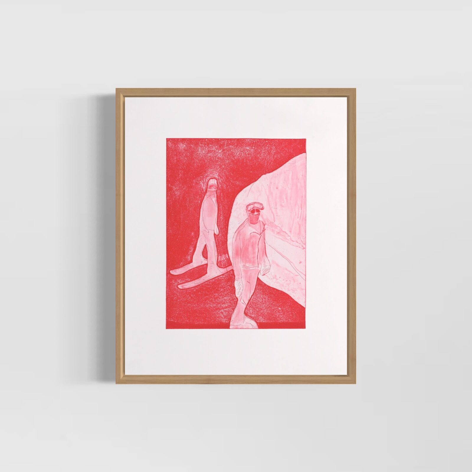 A framed print featuring two stylized figures in a red-toned landscape.