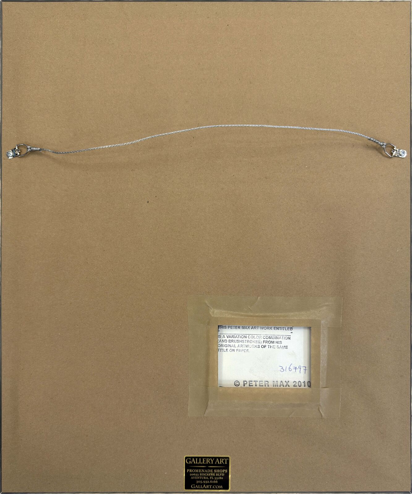 A painting of a person holding an umbrella in a frame.