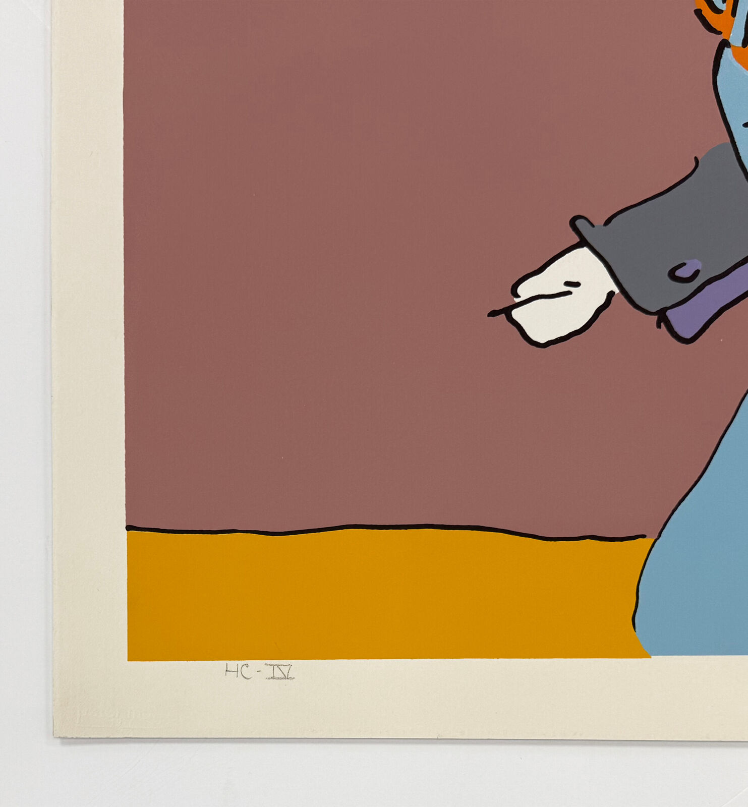 A framed print of two people walking in the desert.