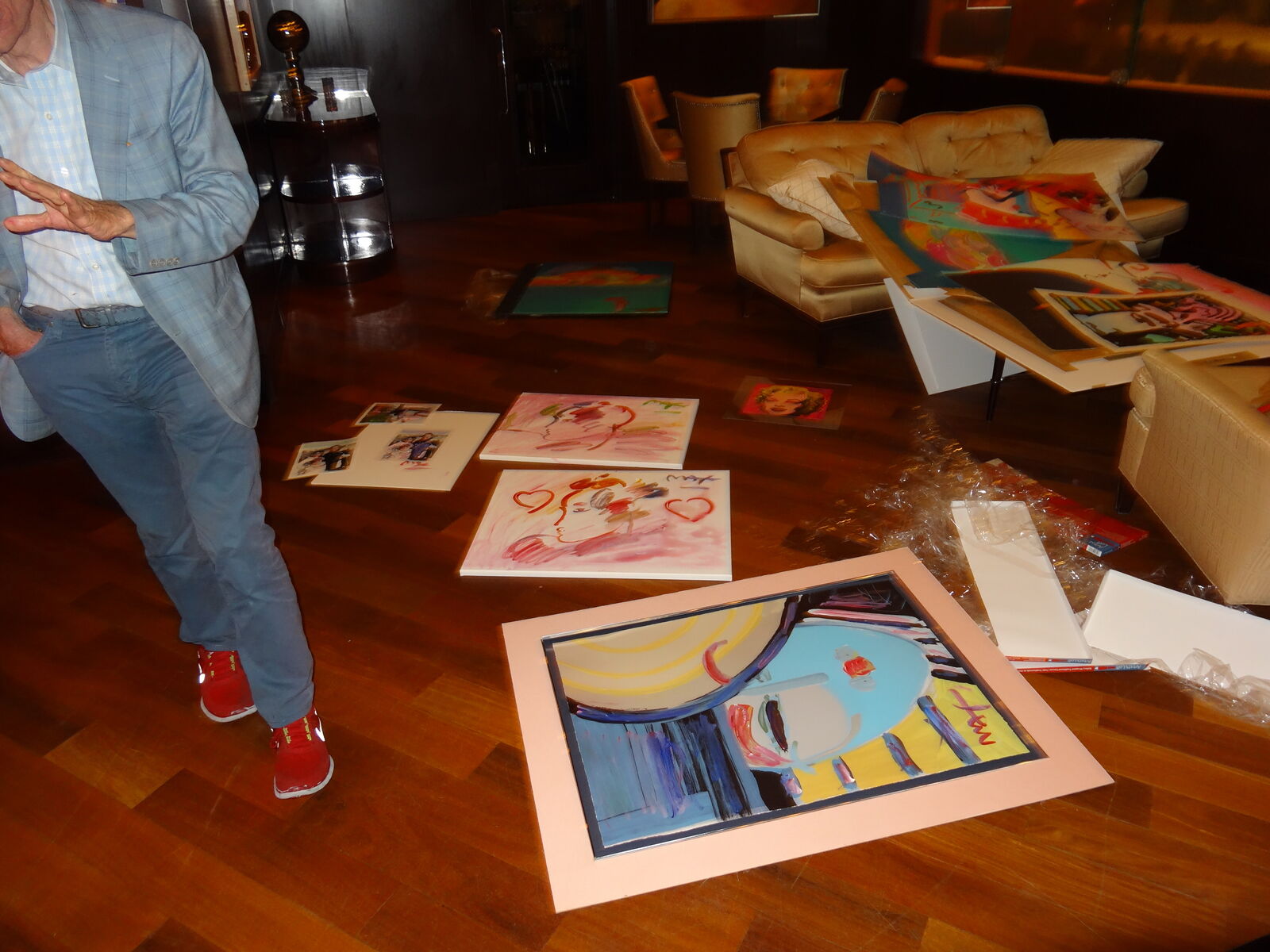 A drawing of a woman's face with flowers in a vase.