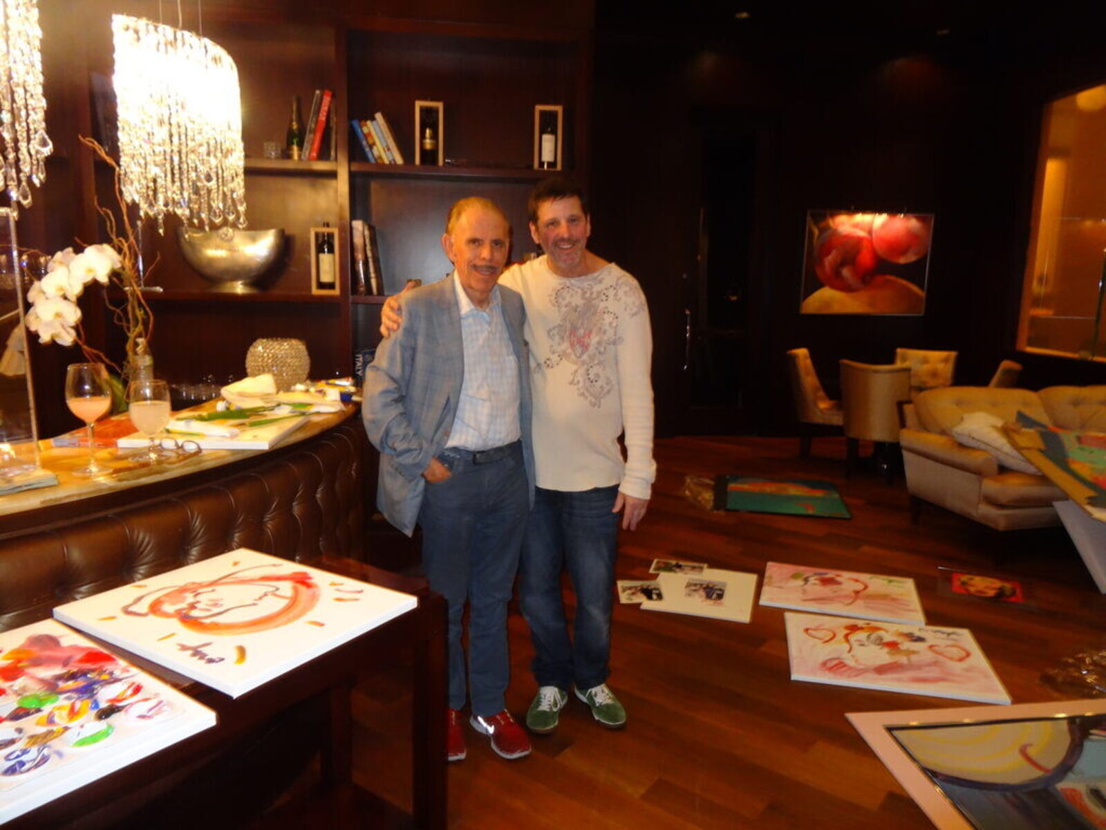 A painting of a woman's face with hearts on it.